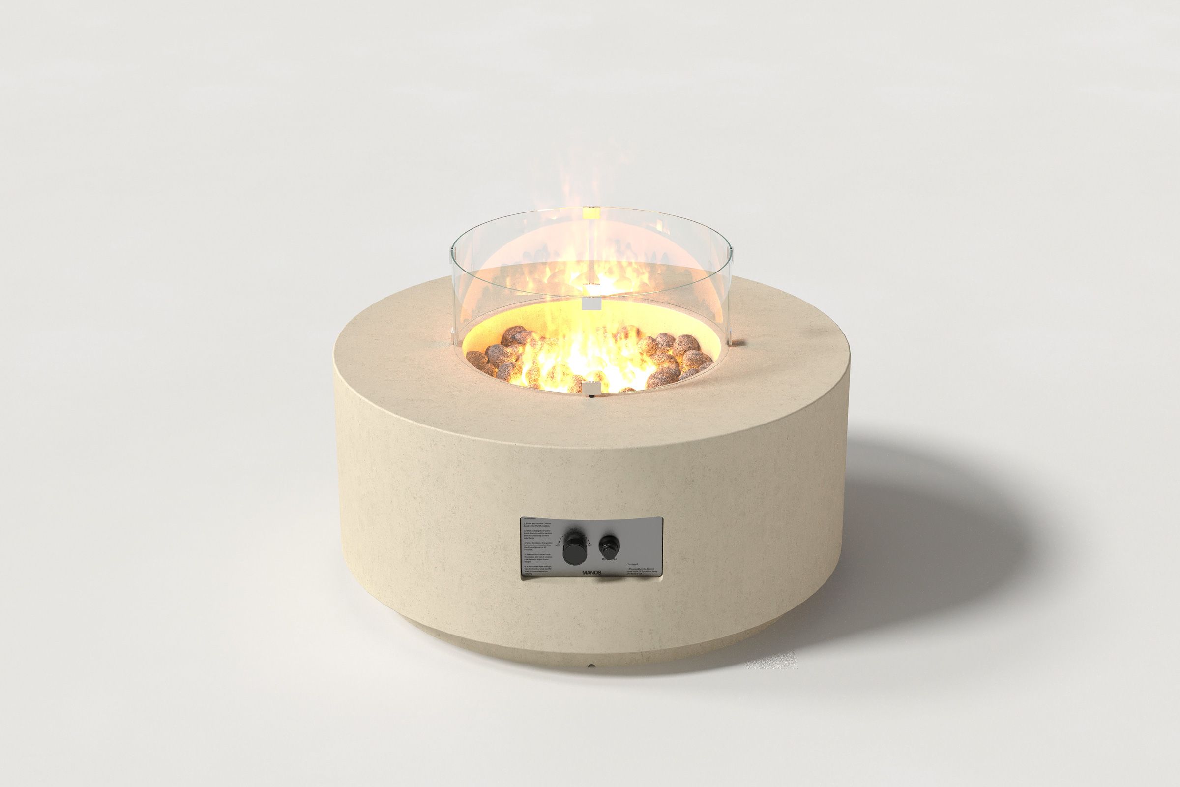 Low cylindrical sand-colored concrete fire pit with thick walls and a central circular well filled with dark volcanic rocks and flame, featuring an integrated control panel and glass shield. Front view on a white background.
