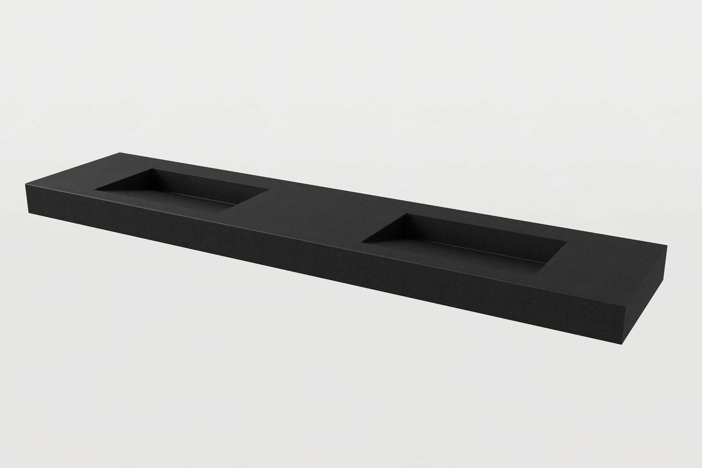 Black Trof sink with two basin slopes, no faucets.