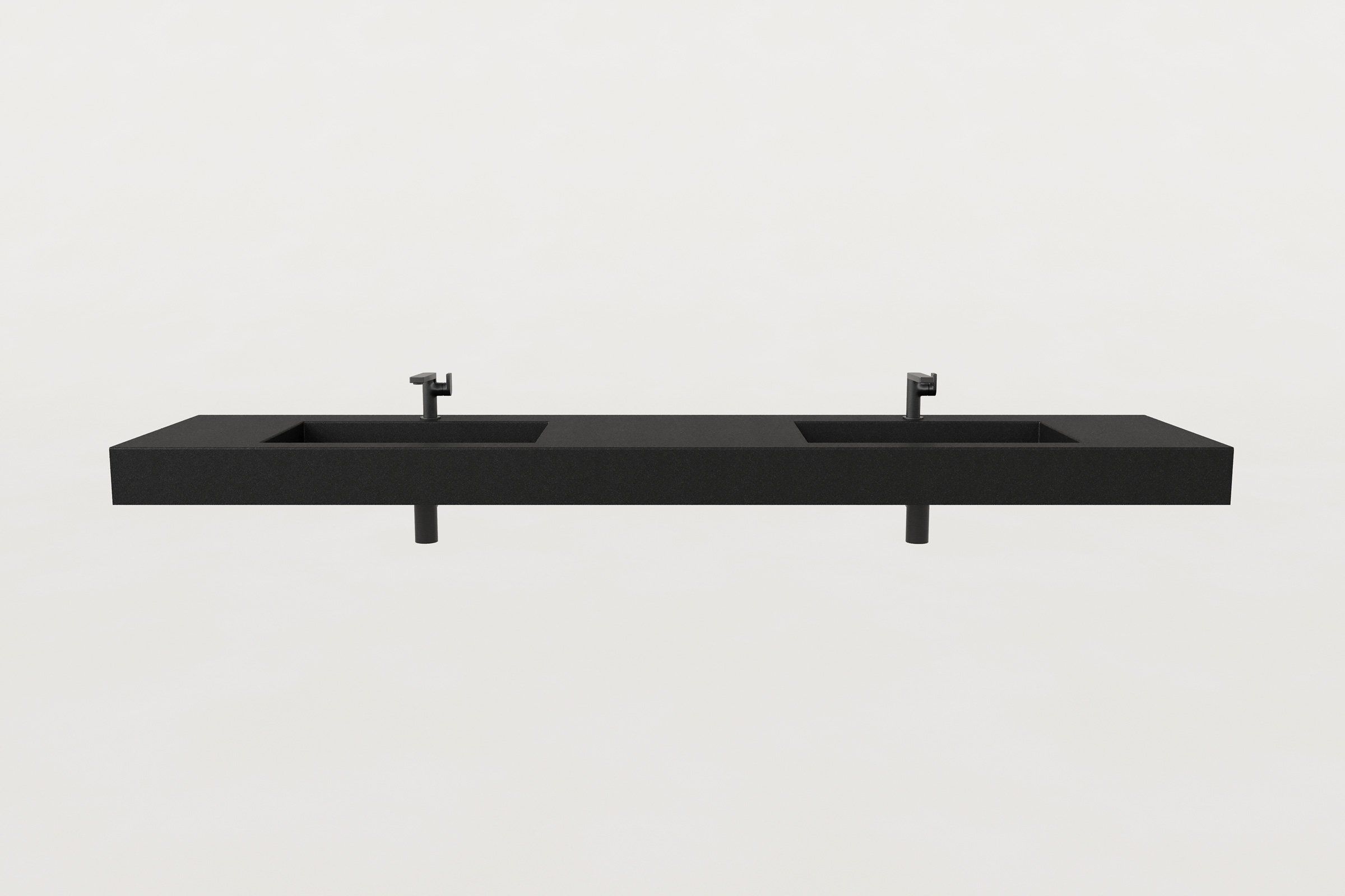 Front view of a black double concrete sink with two basins, matte black faucets, and drain outlets.