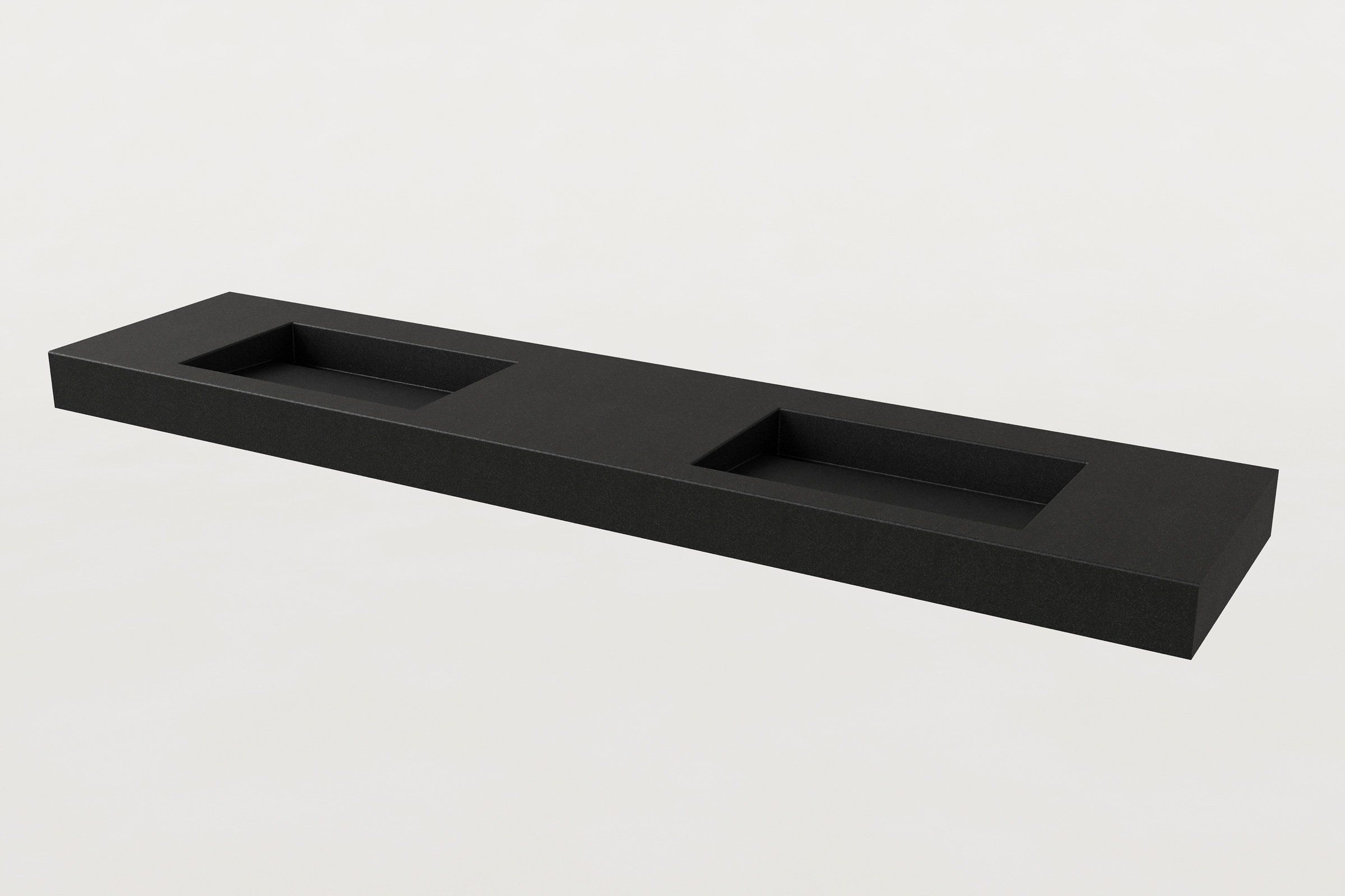 Black concrete double sink with two separate rectangular basins, no faucets installed.