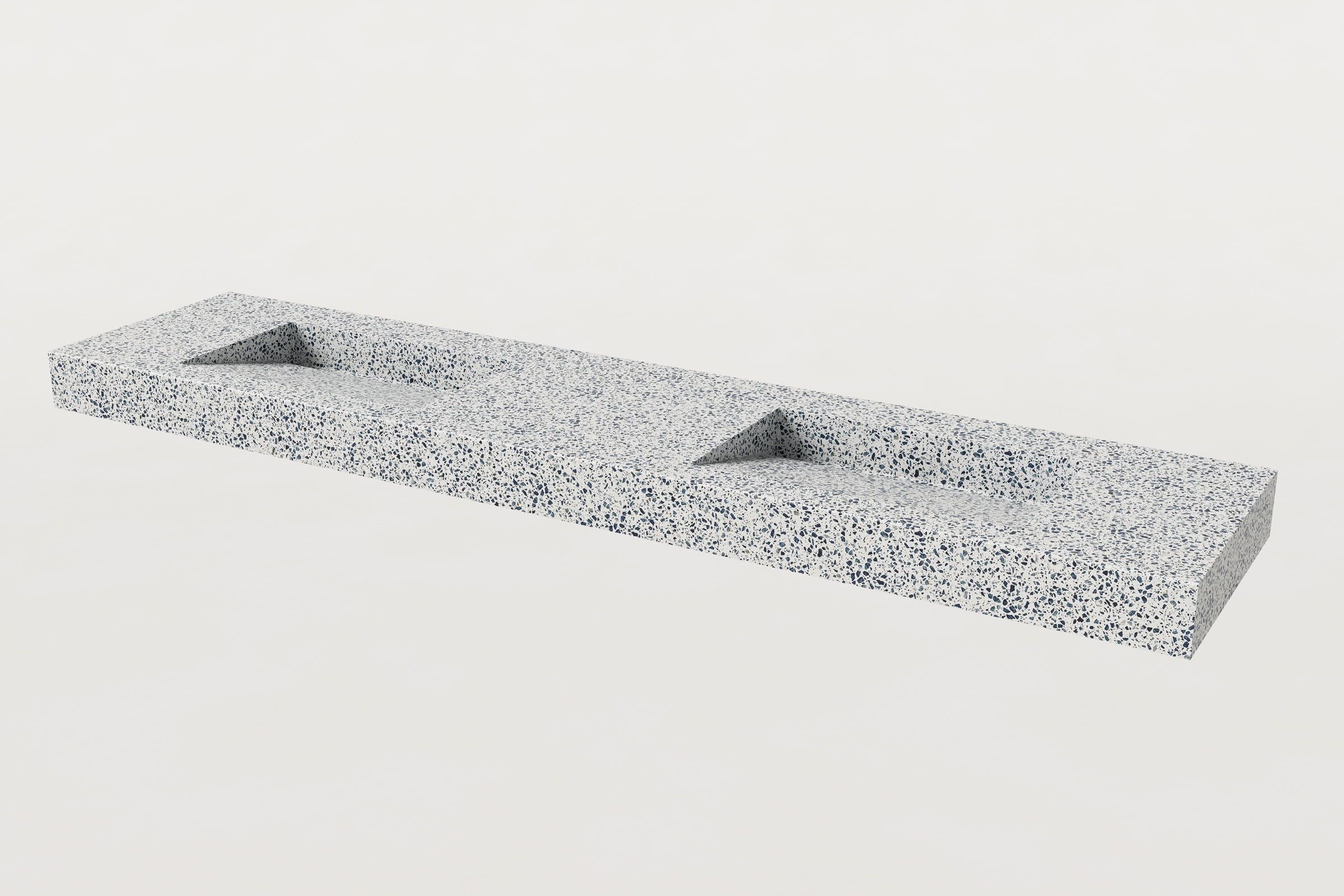 Unazzo Trof sink with two basin slopes, no faucets.