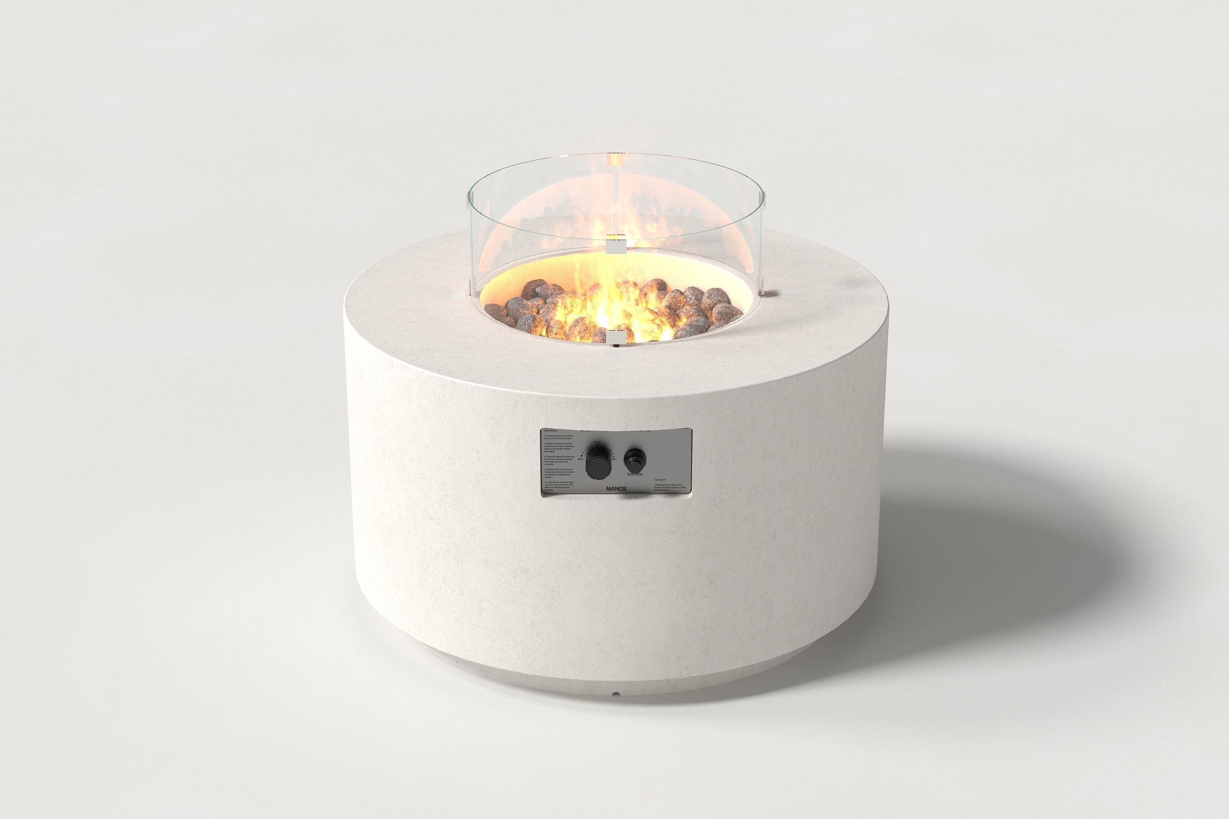 Low cylindrical white colored concrete fire pit with thick walls and a central circular well filled with dark volcanic rocks and flame, featuring an integrated control panel, with a glass shield. Front view on a white background.