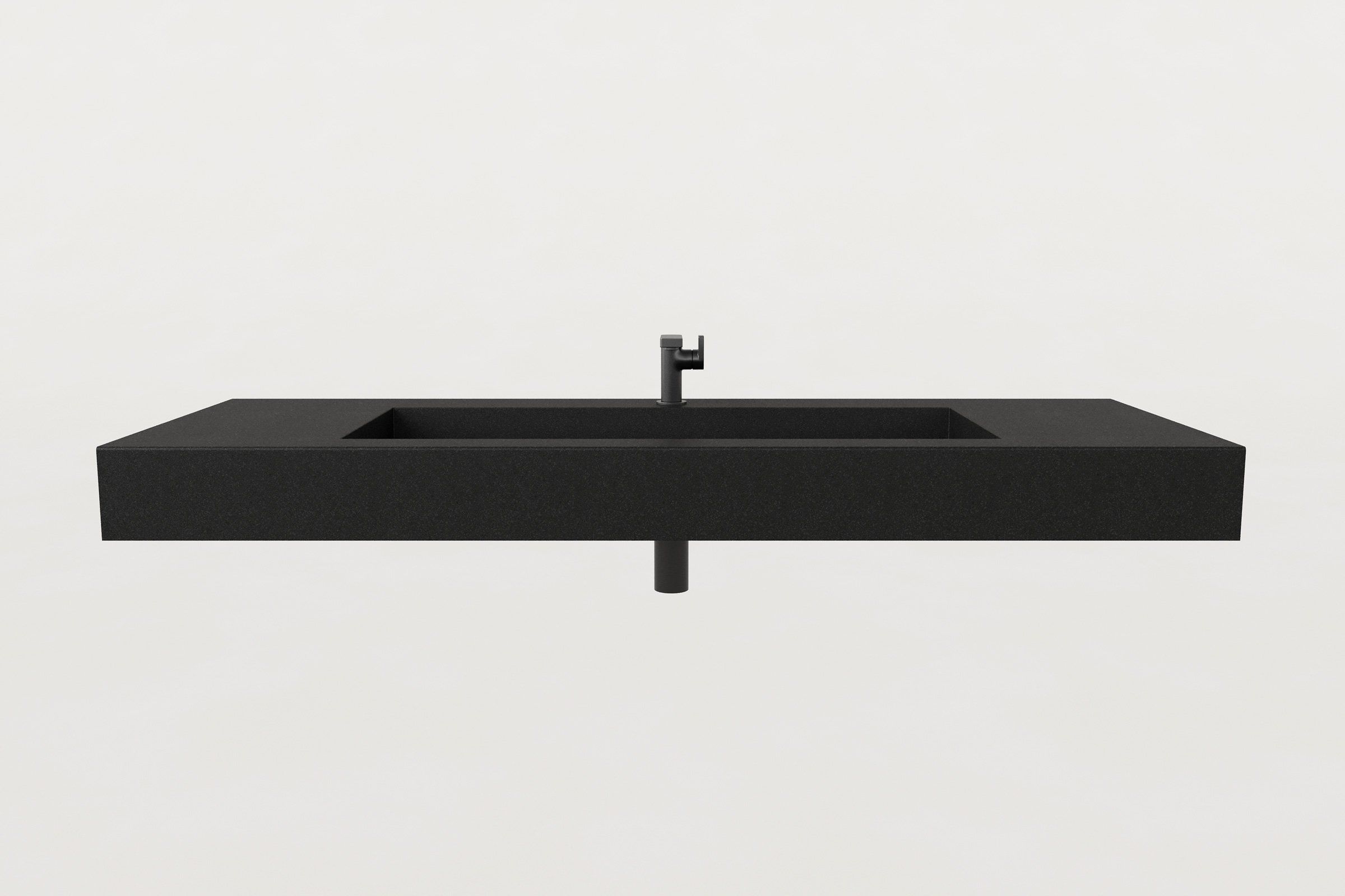 Frontal elevation of the black concrete sink with faucet and drainpipe visible beneath.