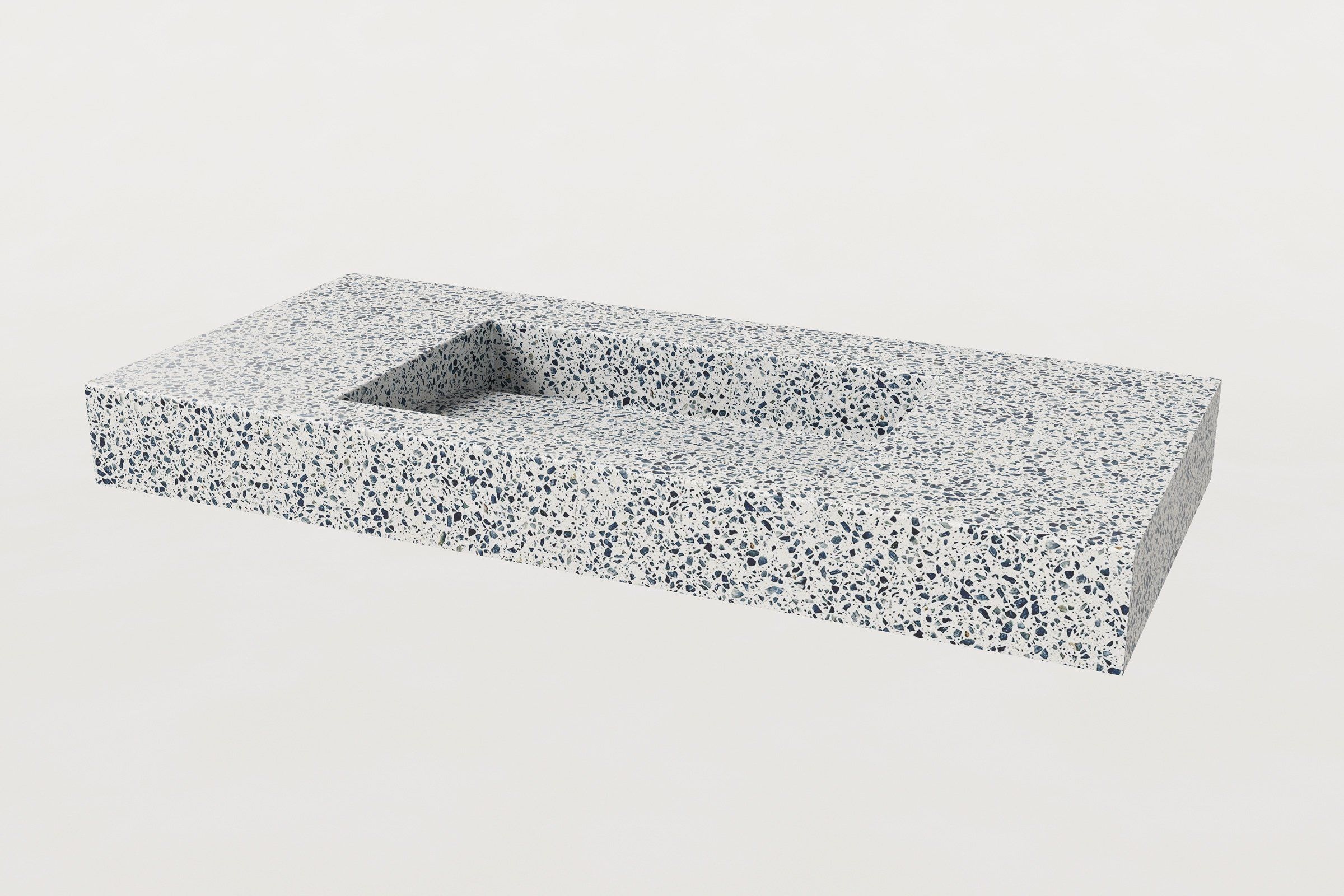 Angled top view of a terrazzo sink in Unazzo finish with rectangular basin, no faucet installed.