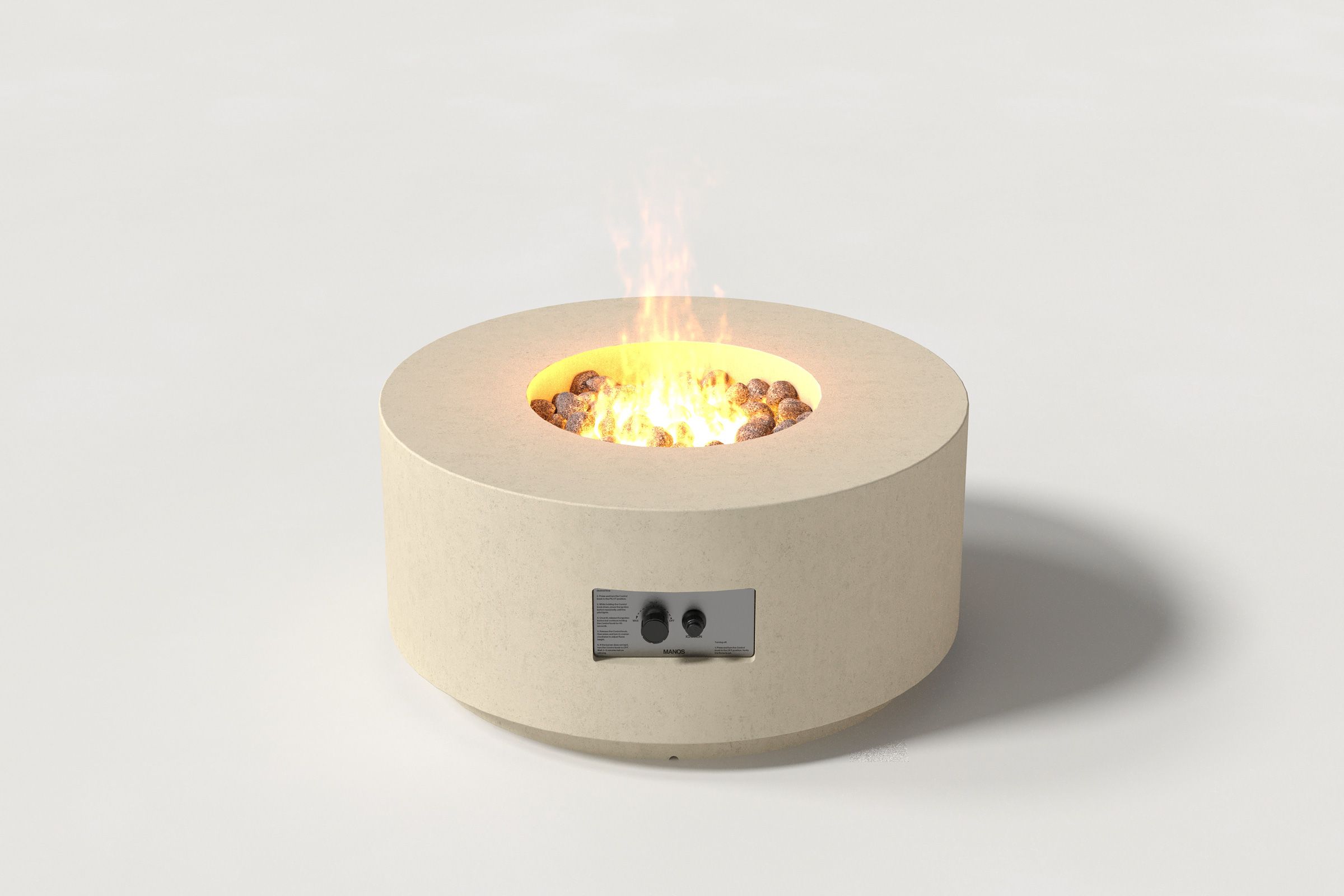 Low cylindrical sand-colored concrete fire pit with thick walls and a central circular well filled with dark volcanic rocks and flame, without the glass shield. Side view on a white background.