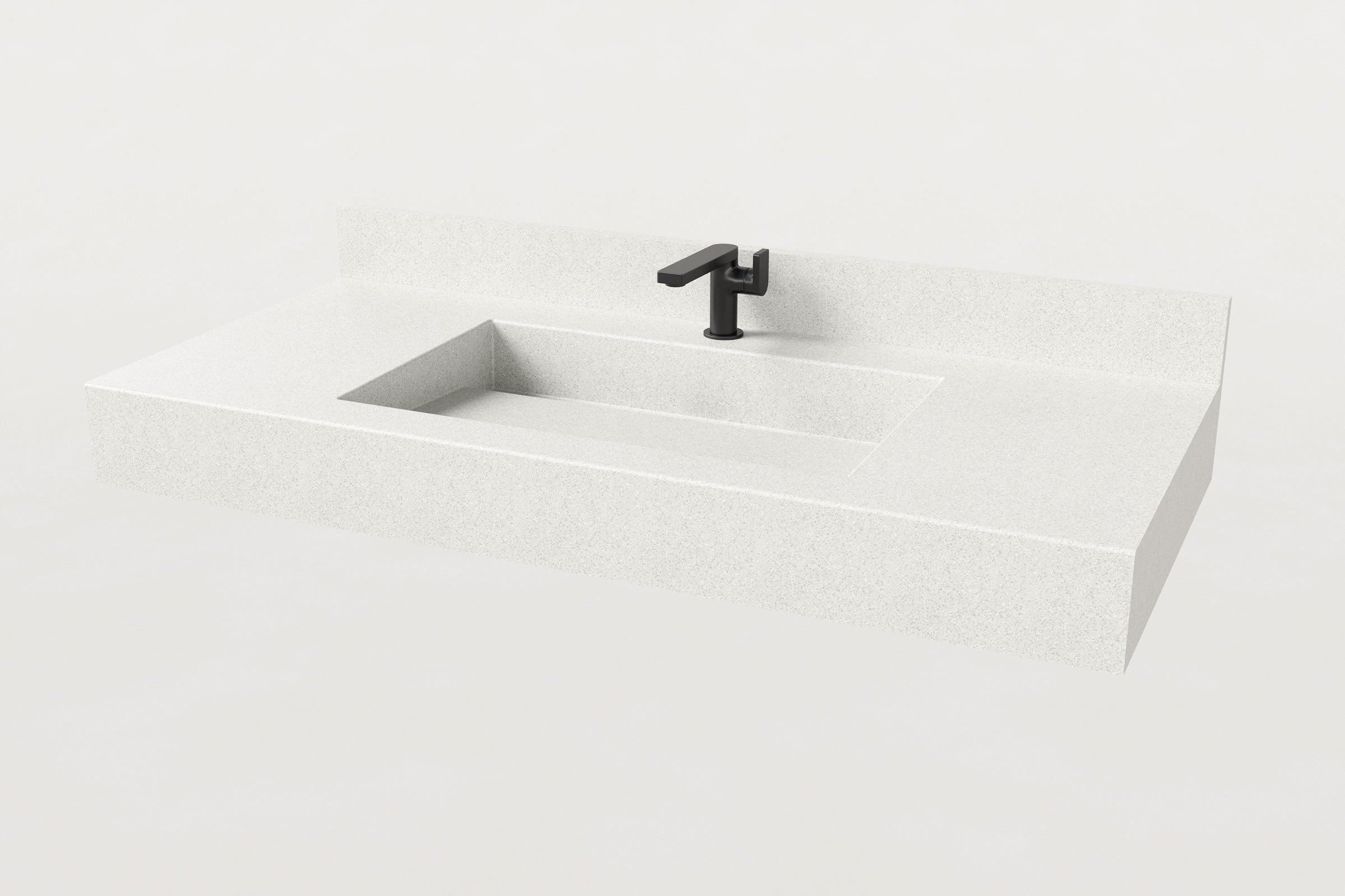 Manos Trof Drop 48 concrete sink in Chalk finish with integrated backsplash and matte black faucet.