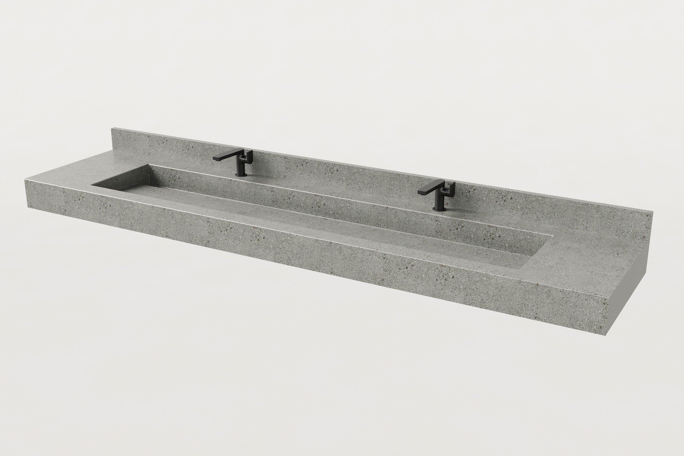 Concrete trough sink with a long rectangular basin and backsplash, fitted with two black faucets.