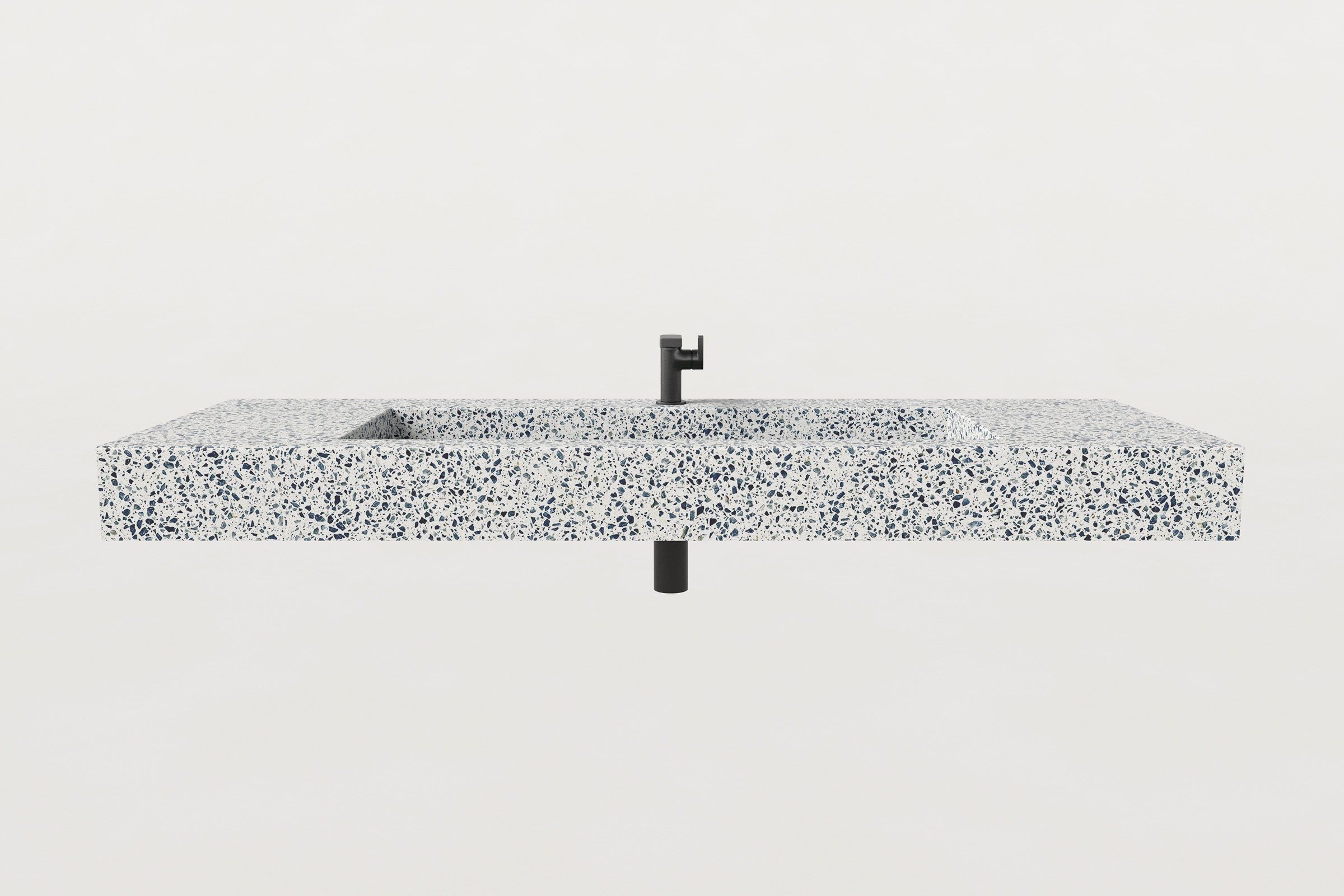 Front elevation view of Trof Drop 60 sink in Unazzo terrazzo finish with matte black faucet and centered drain pipe.