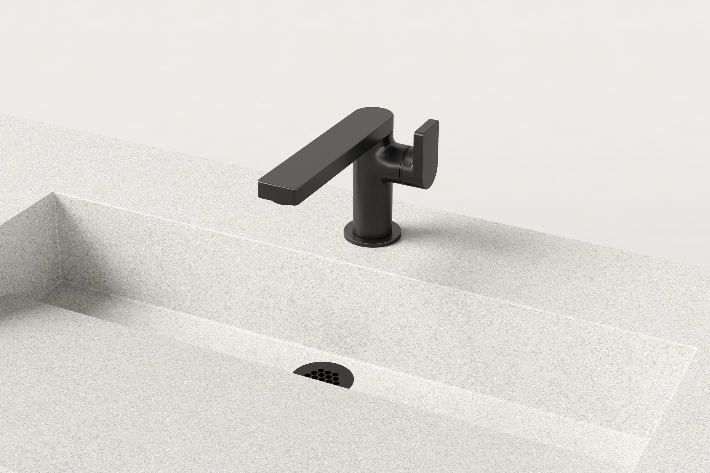 Close-up of black faucet and drain detail on Chalk Trof sink.