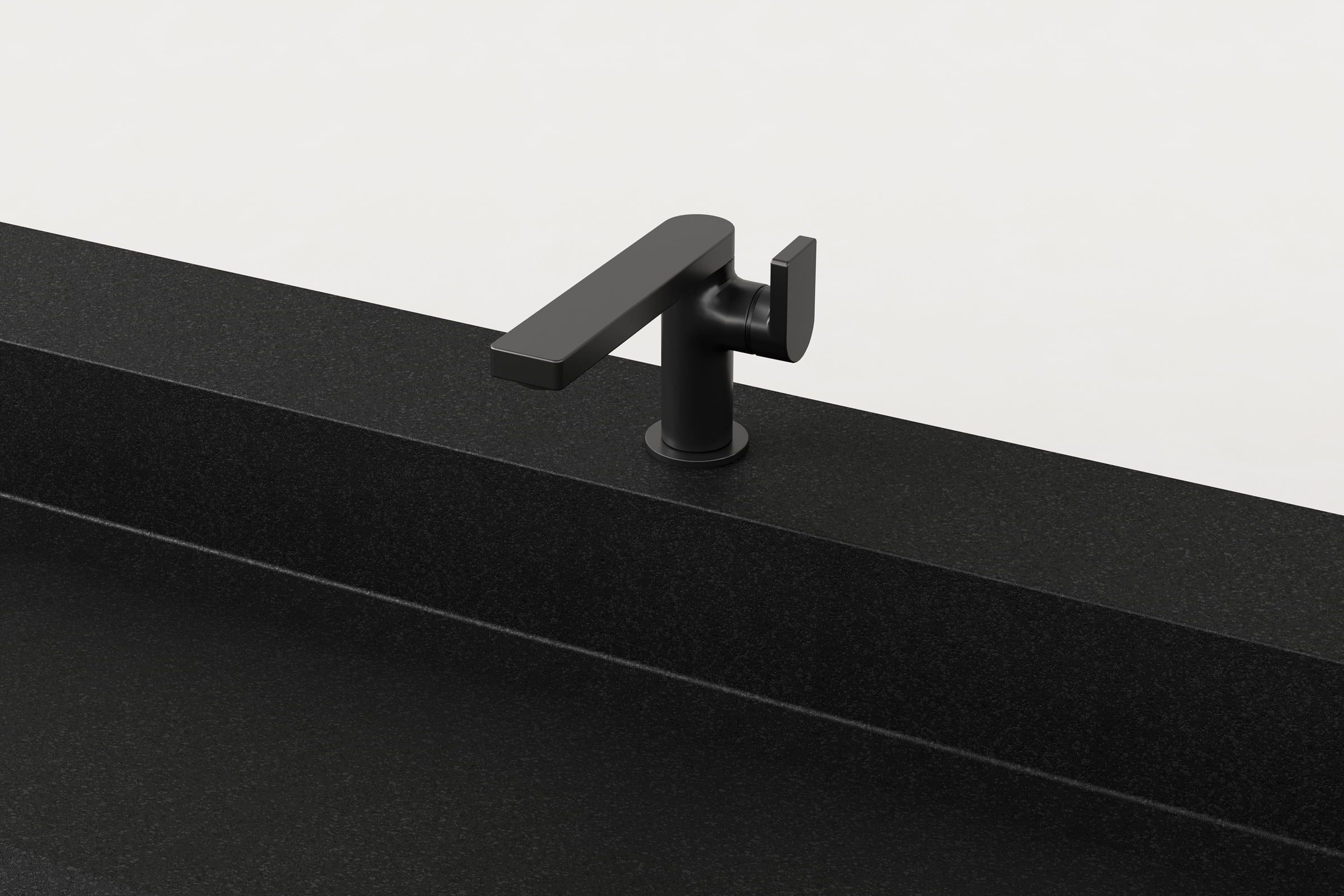 Close-up of matte black faucet on Storm Trof sink.