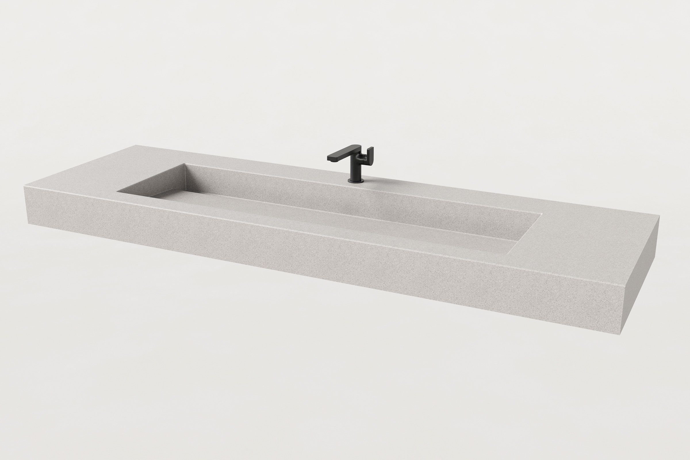 Rectangular concrete sink basin in Fog finish with a matte black faucet.
