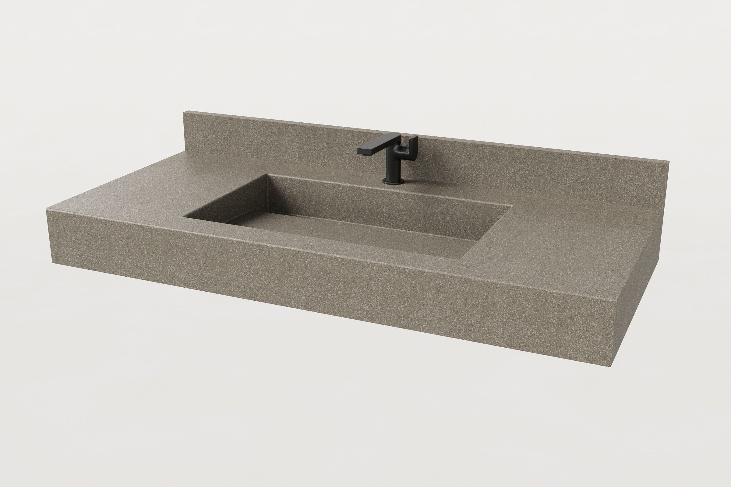 Manos Trof Drop 48 concrete sink in Hurricane finish with integrated backsplash and matte black faucet.