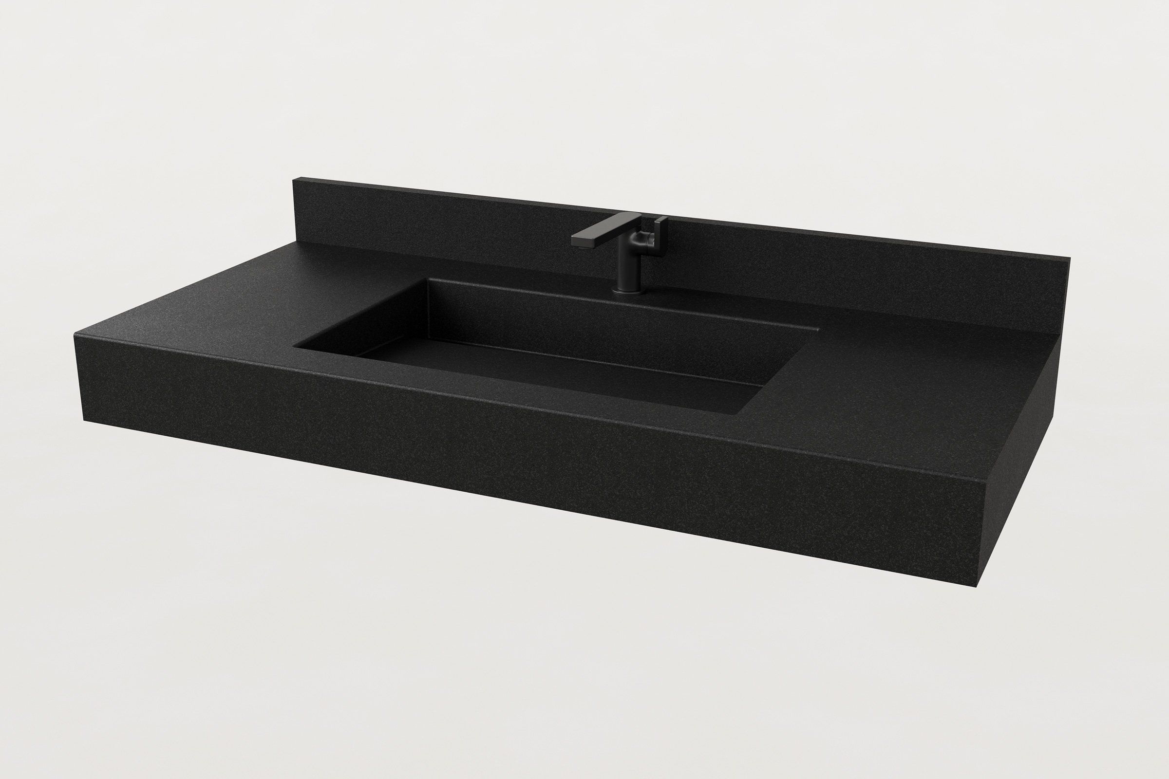 Trof Drop 48 concrete sink in Storm finish with integrated backsplash and matte black faucet.