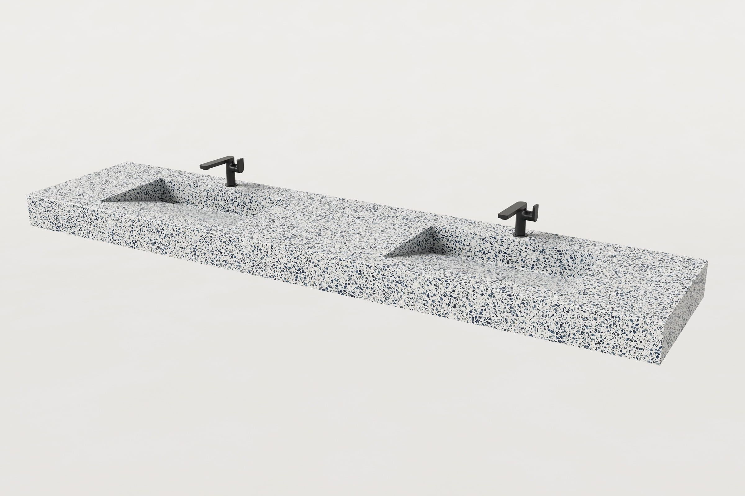 Unazzo terrazzo double-basin Trof sink with faucets.