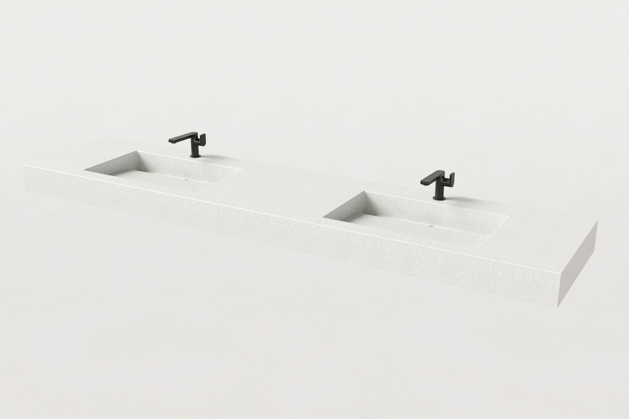 Double-basin white concrete sink with two matte black faucets, one positioned above each basin.