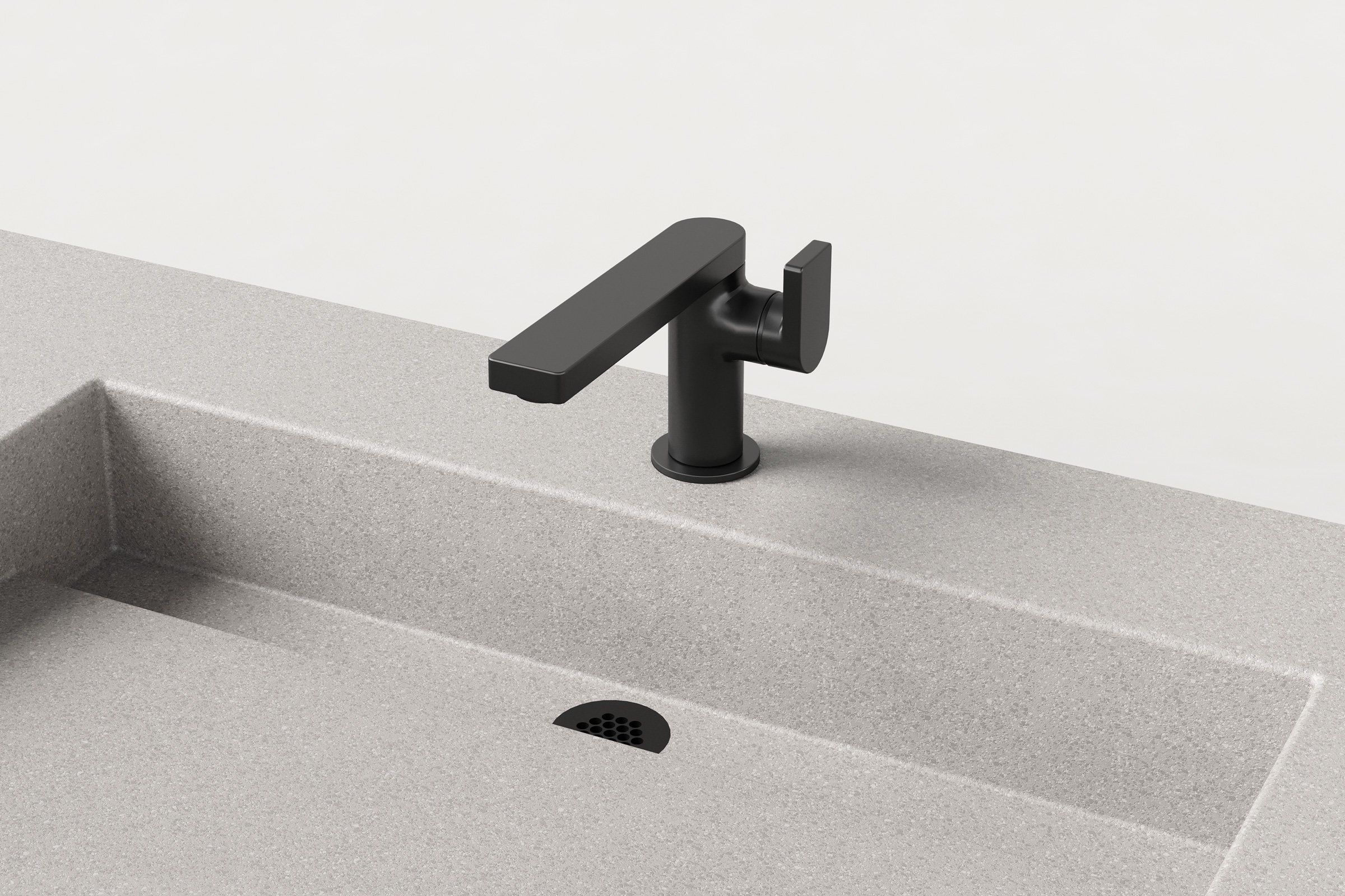 Close-up of matte black faucet and drain detail on fog finish double-basin sink.