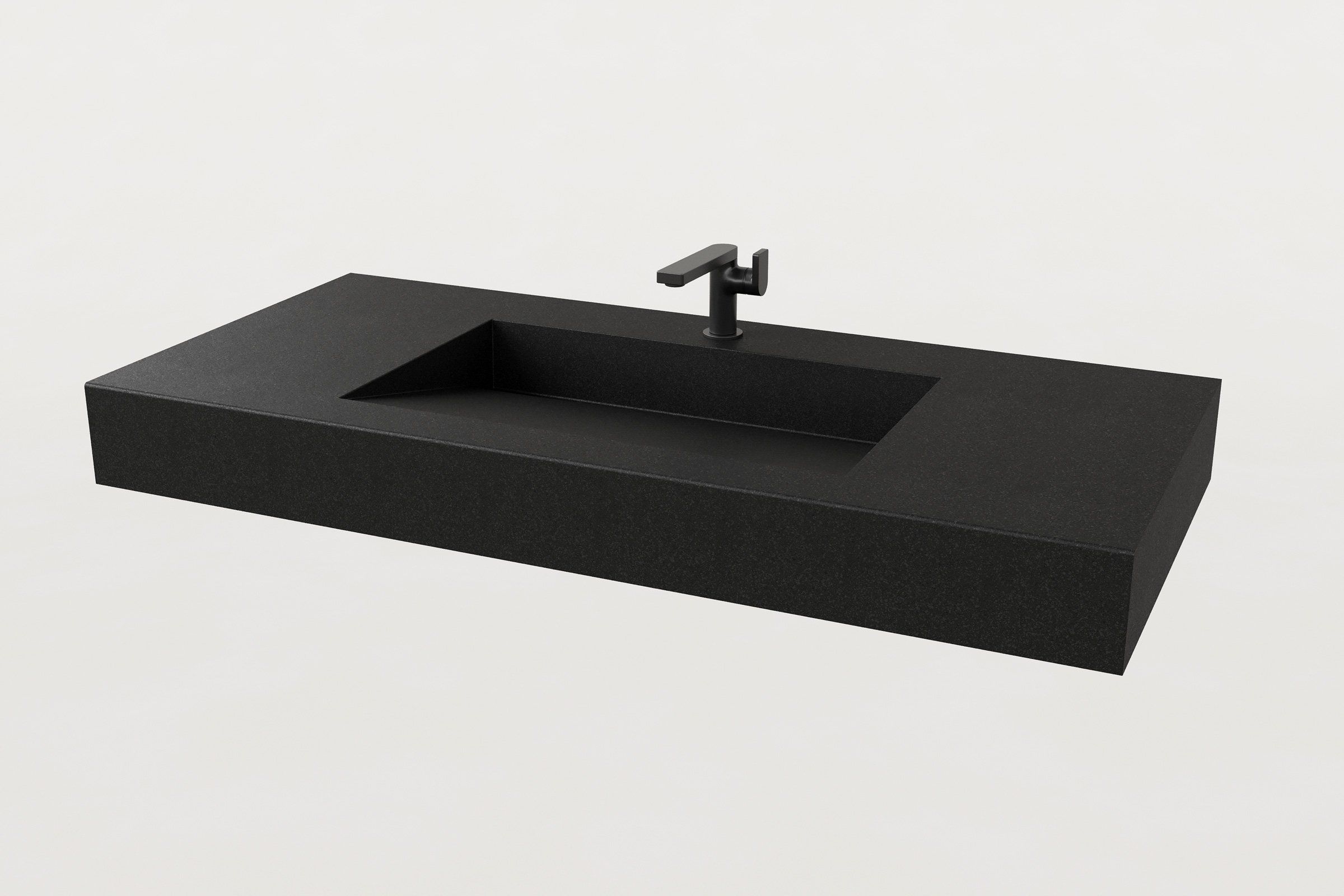 Rectangular concrete sink basin in Storm finish, shown with a matte black faucet.