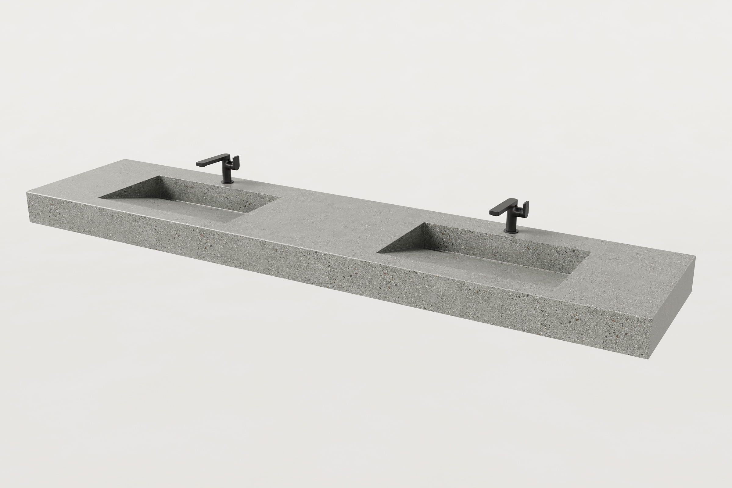 Concrete terrazzo double-basin Trof sink with faucets.