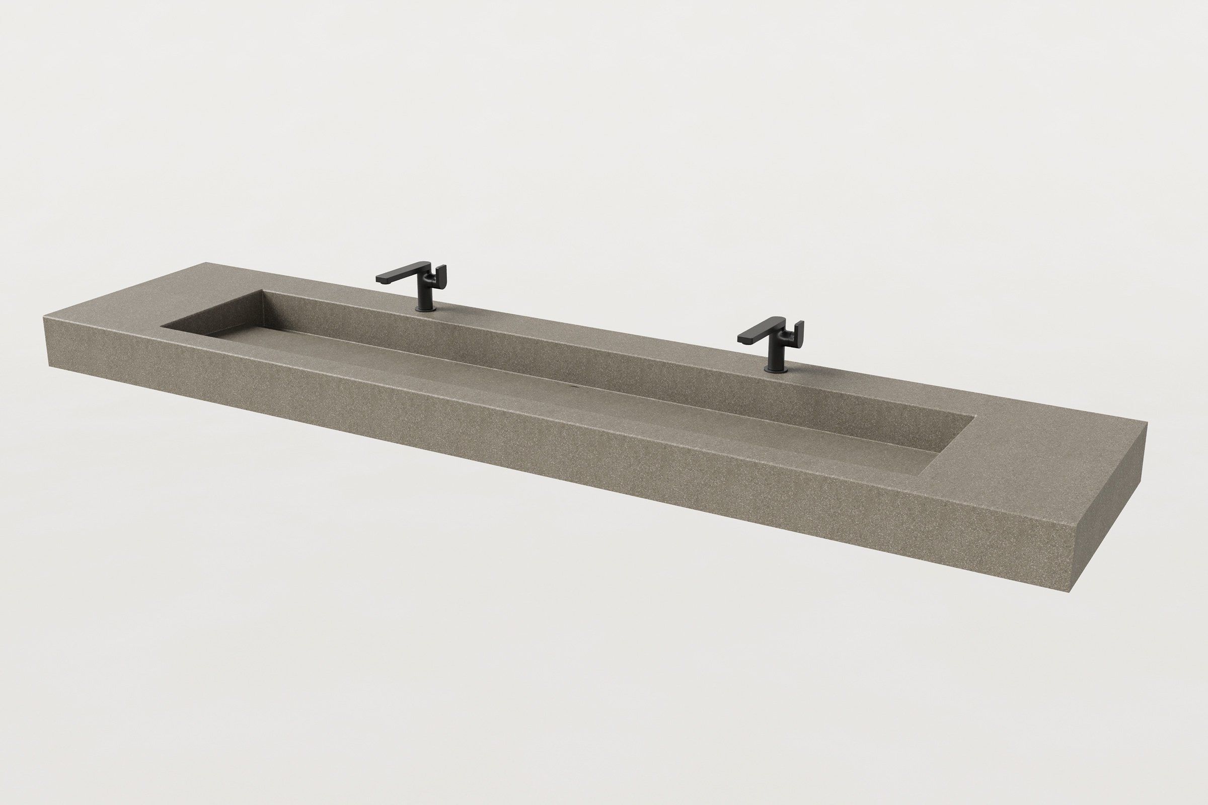 Concrete sink basin in hurricane finish with two matte black faucets mounted along the trough.