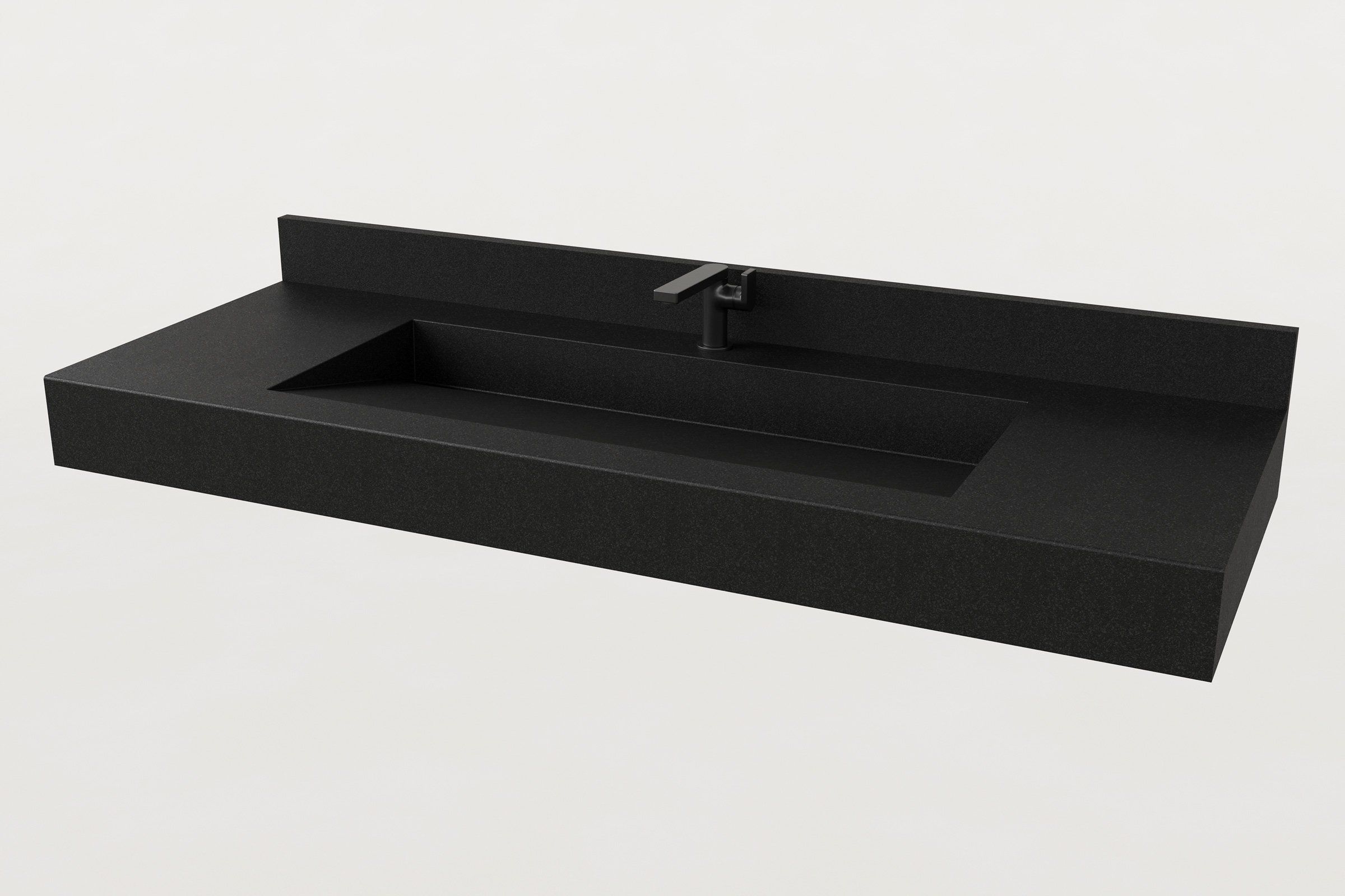 Black concrete sink with a short backsplash and a matte black faucet, viewed at a slight angle.