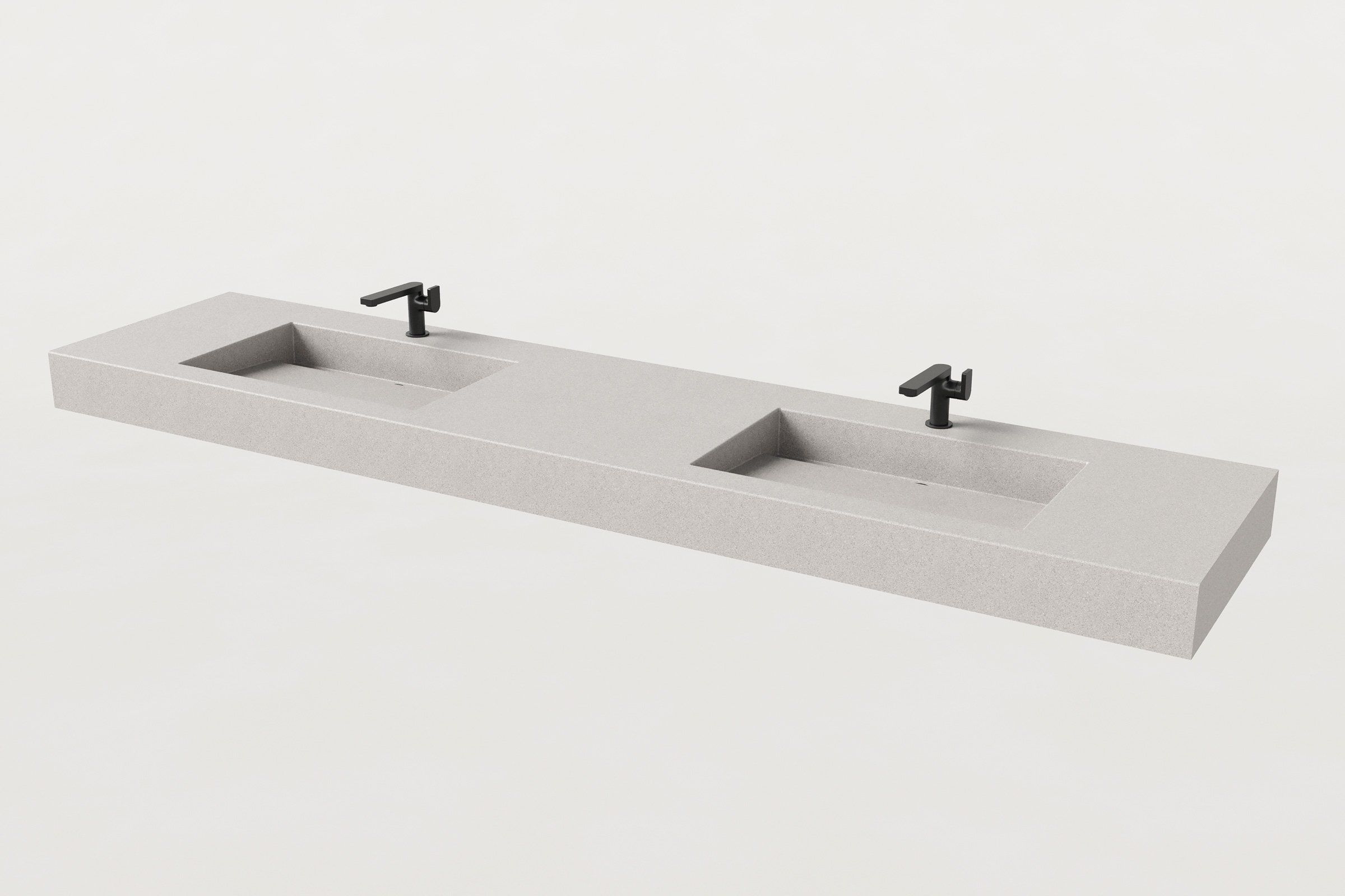 Rectangular double-basin concrete sink in fog finish with two matte black faucets installed.