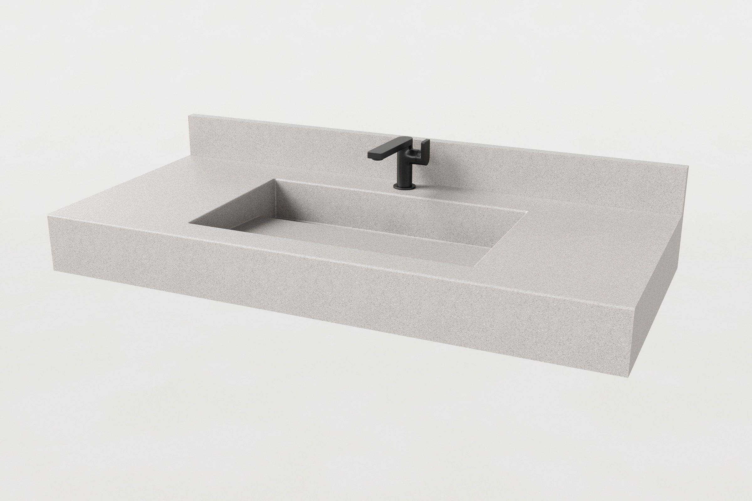 Manos Trof Drop 48 concrete sink in Chalk finish with integrated backsplash and matte black faucet.