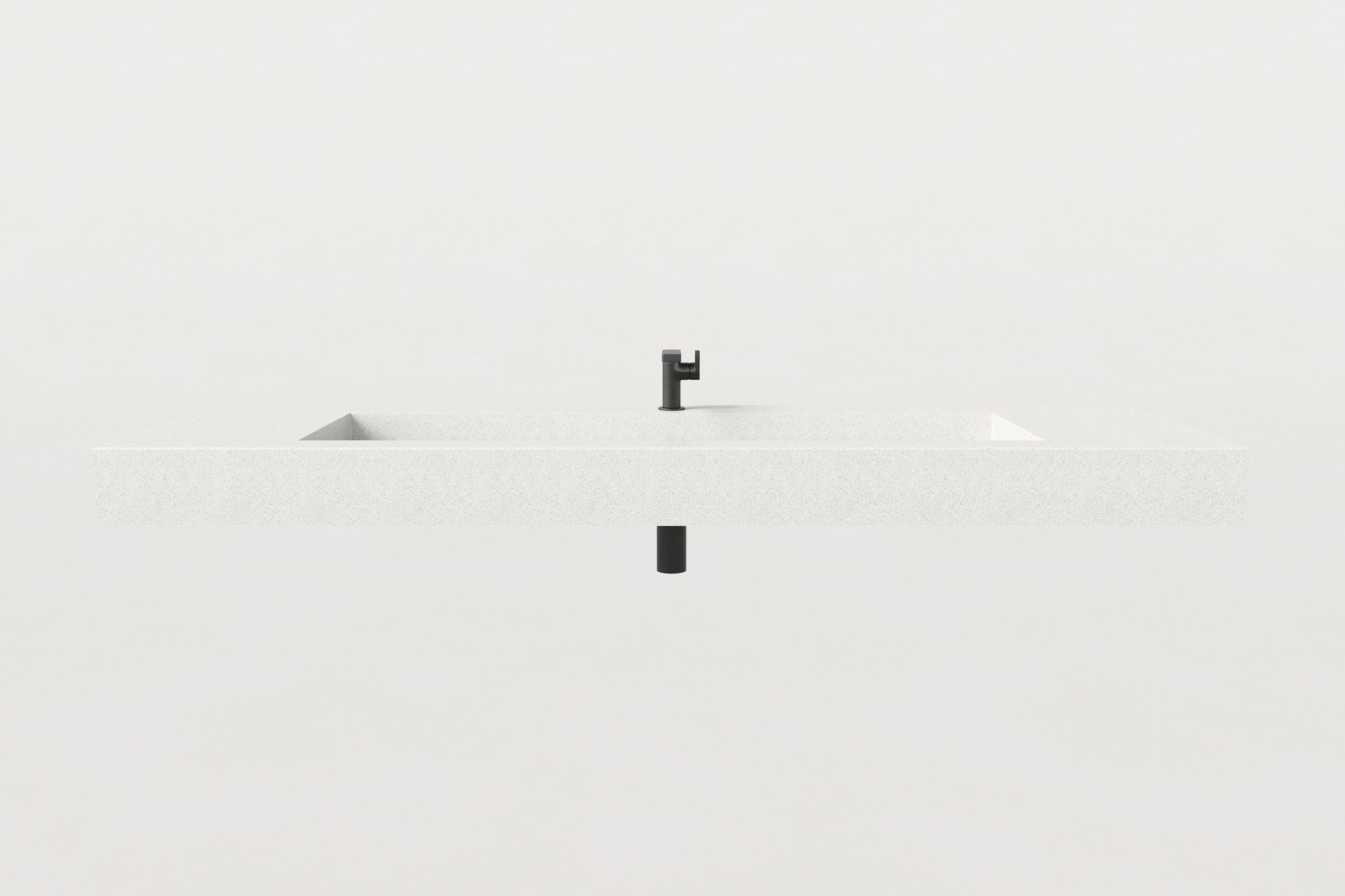 A front elevation view of the Chalk concrete sink with faucet and visible drainpipe, showcasing its symmetrical, linear form.