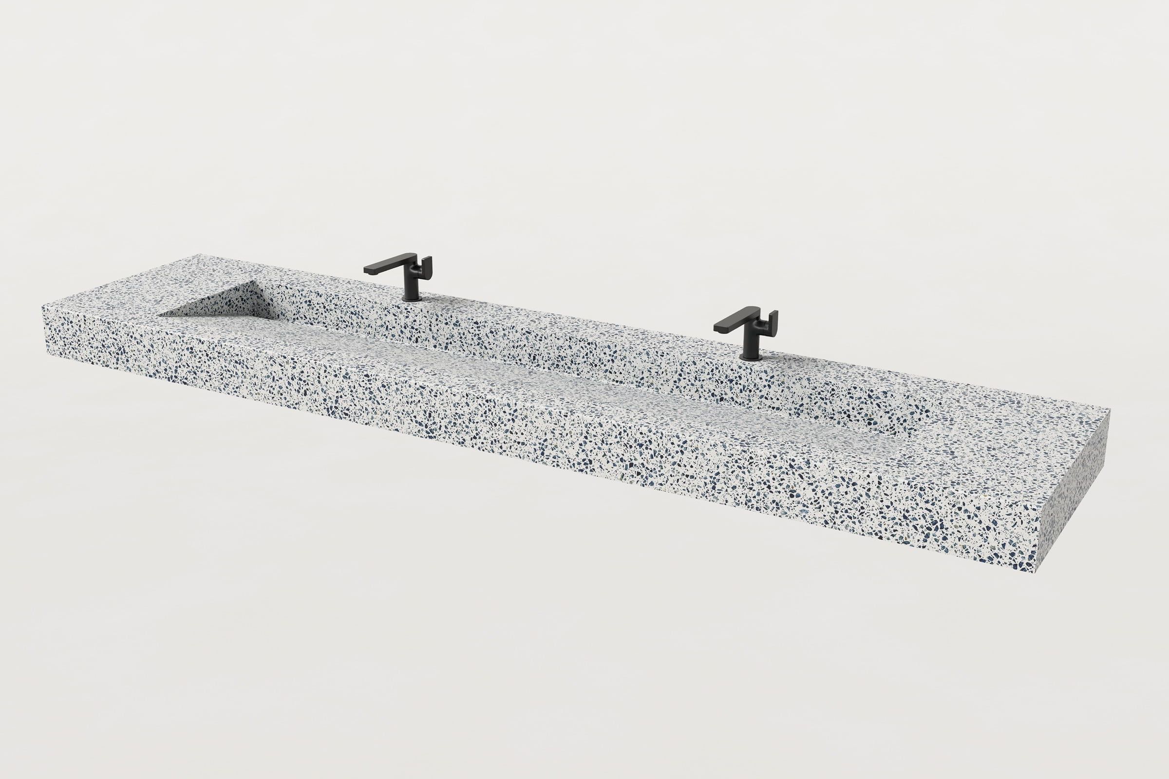 Unazzo terrazzo Trof sink with two matte black faucets.