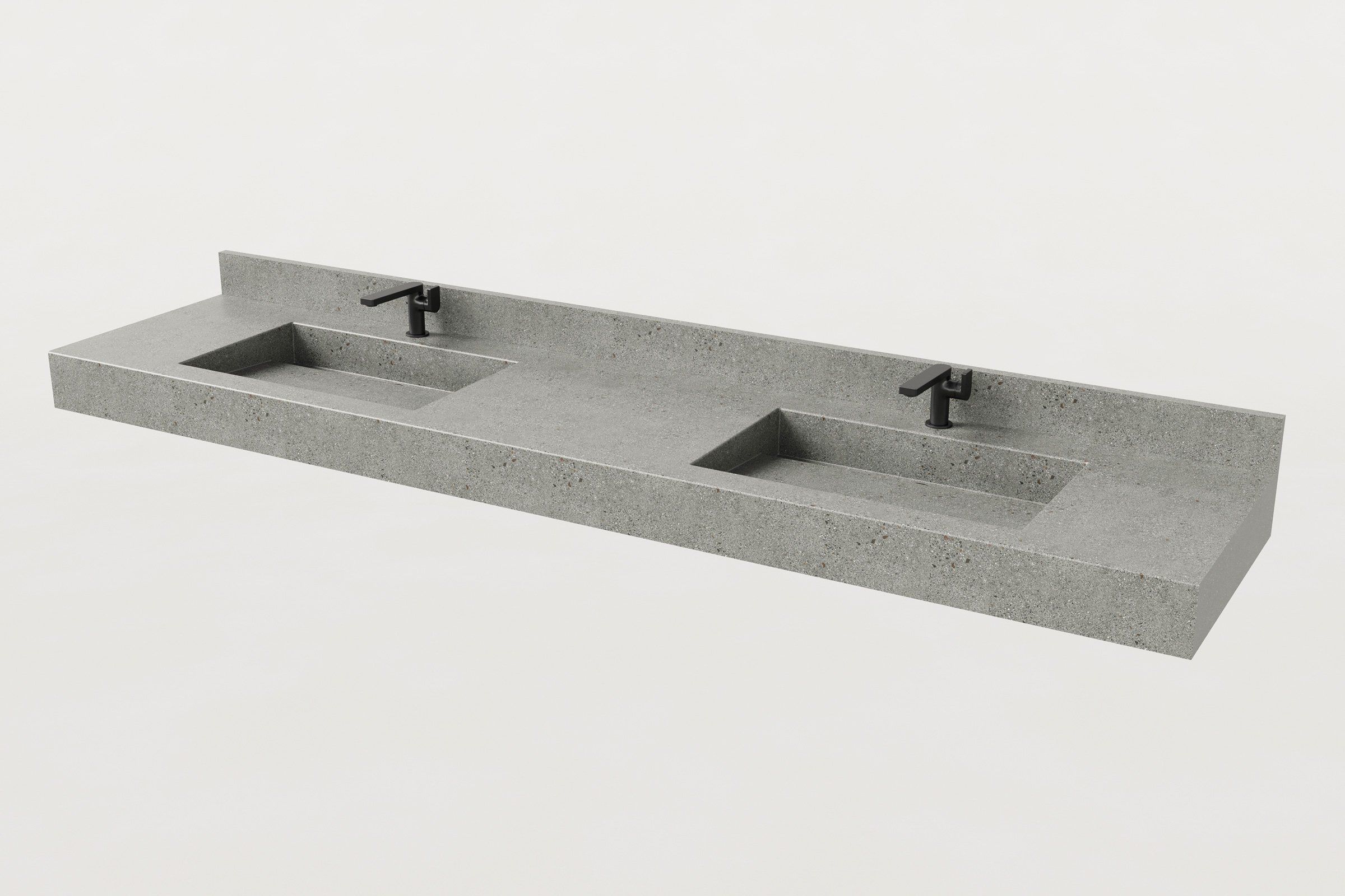 Angled view of concrete double-basin sink with dual matte black faucets.