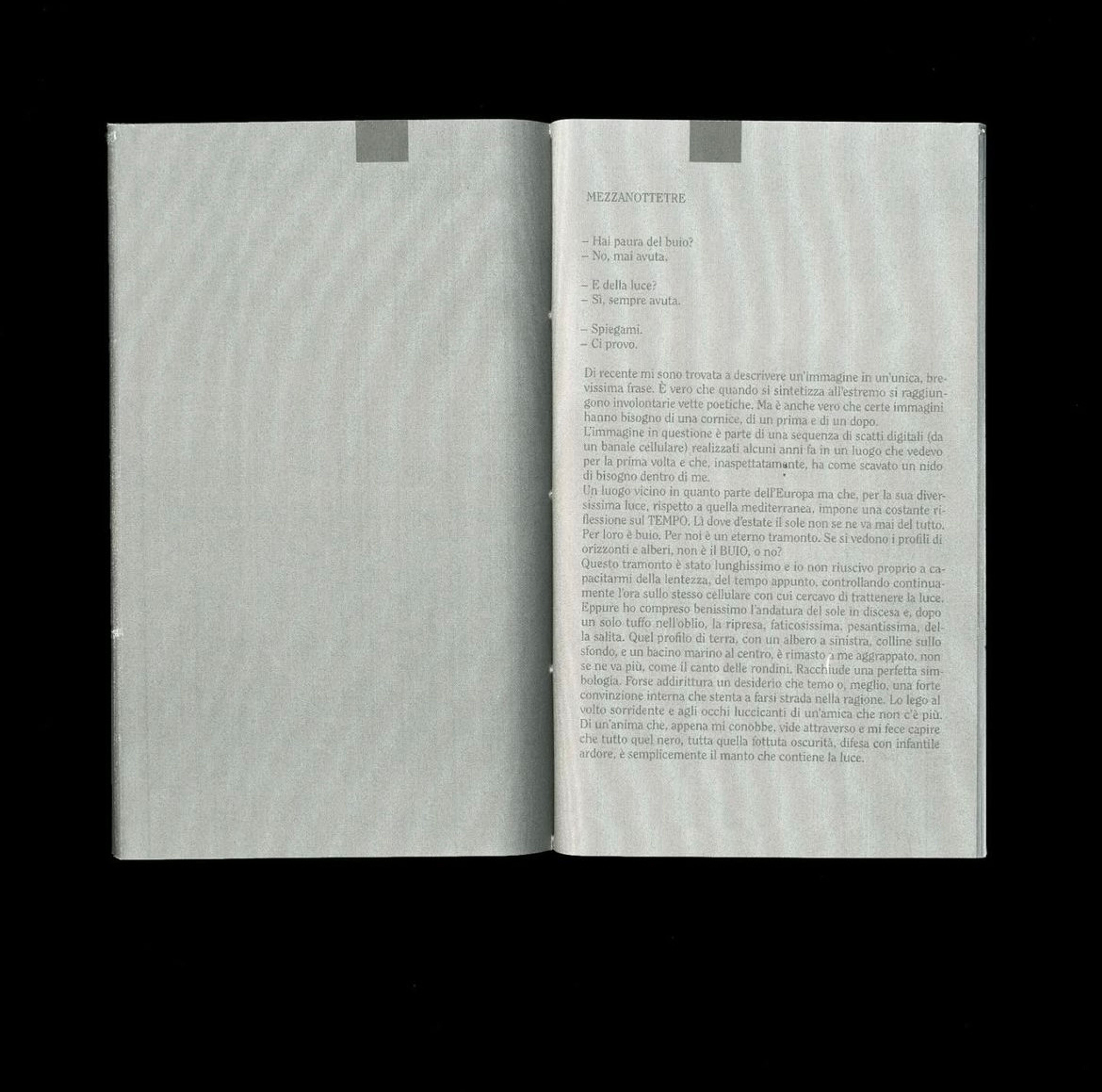 Spread with a printed text in Italian