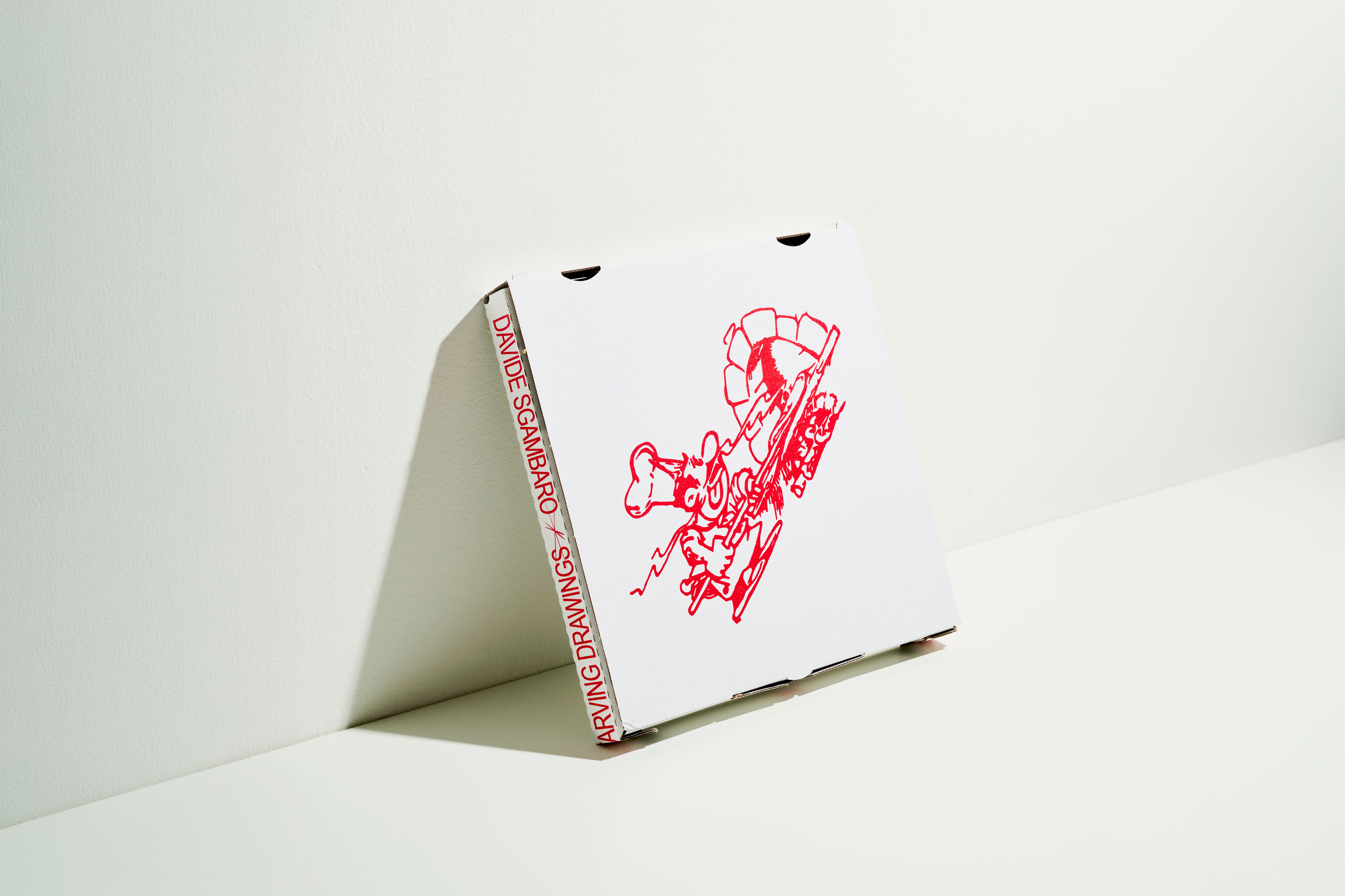 Pizza box edition with STARVING DRAWINGS printed on the spine