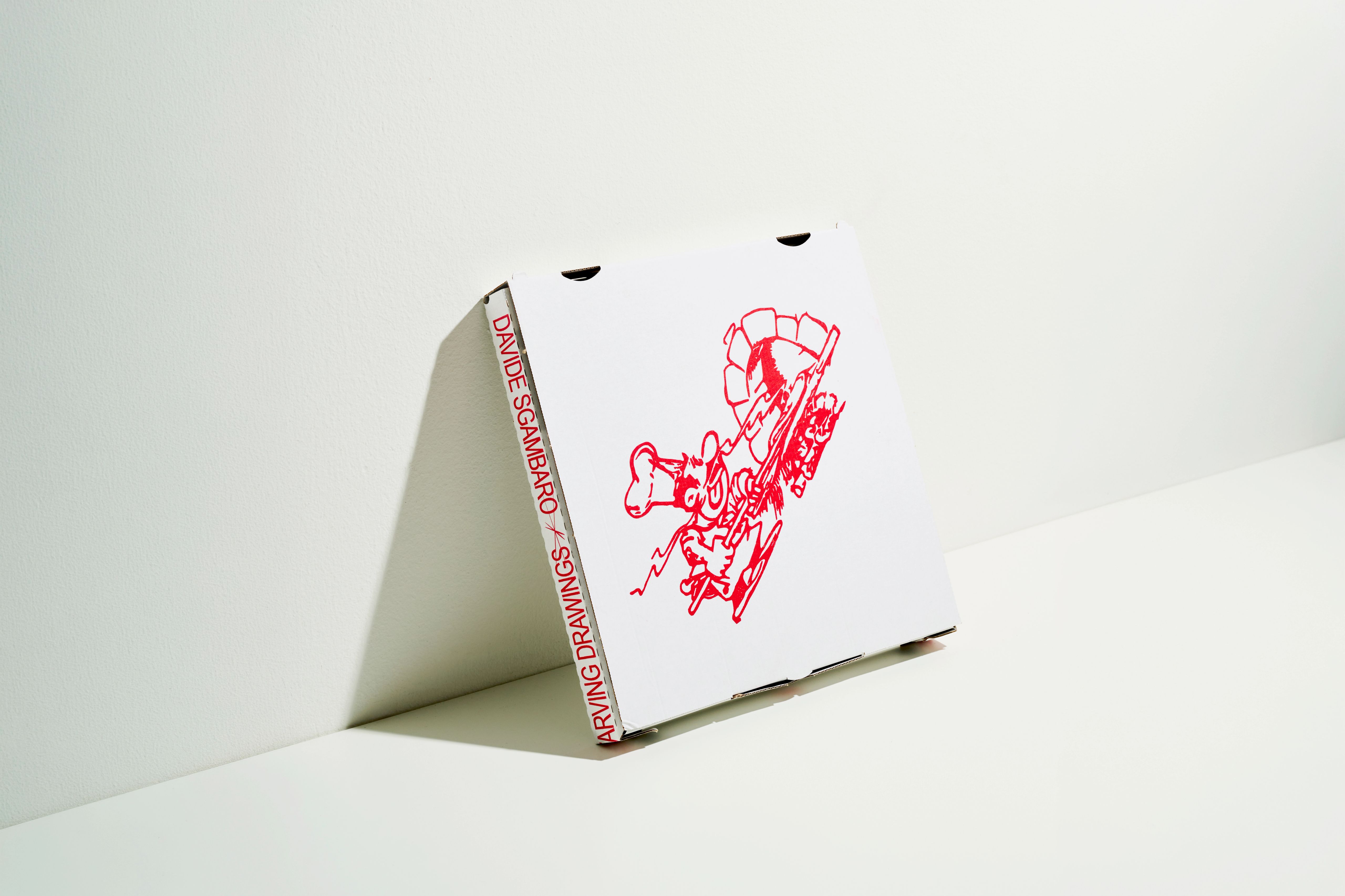 Pizza box edition with STARVING DRAWINGS printed on the spine