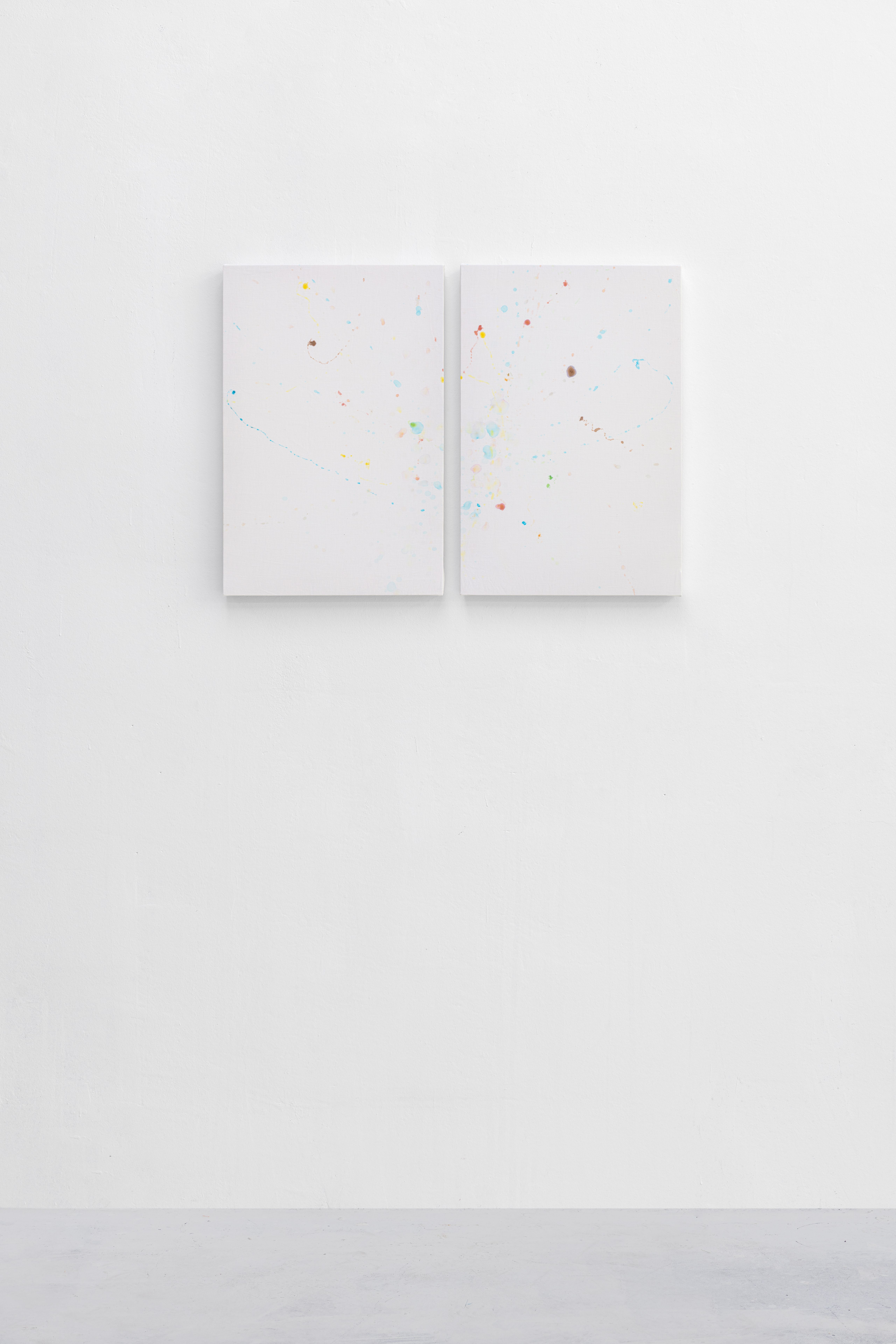 Small diptych of stained white sheets on a white wall