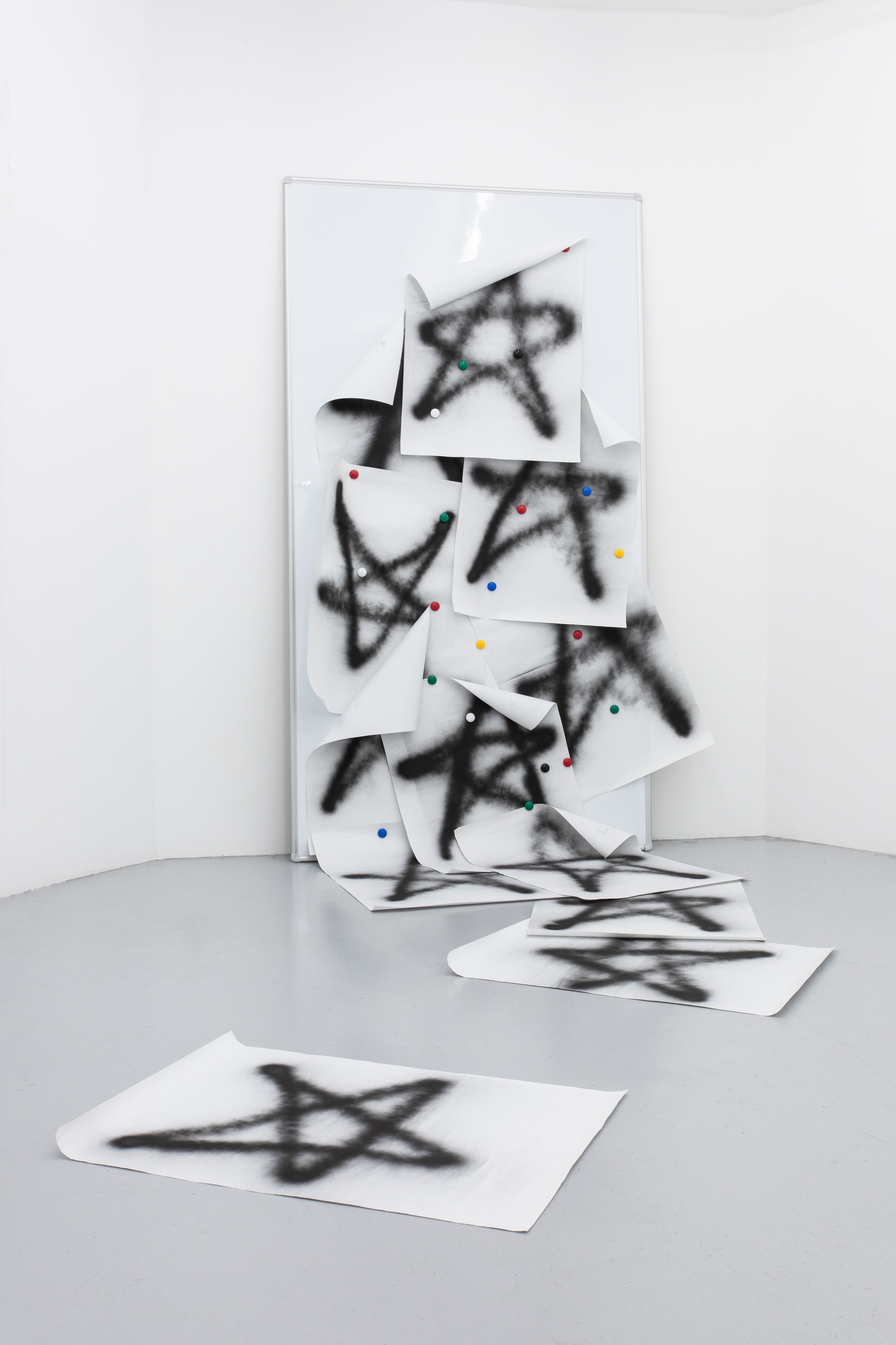 drawings of stars falling from a magnetic blackboard