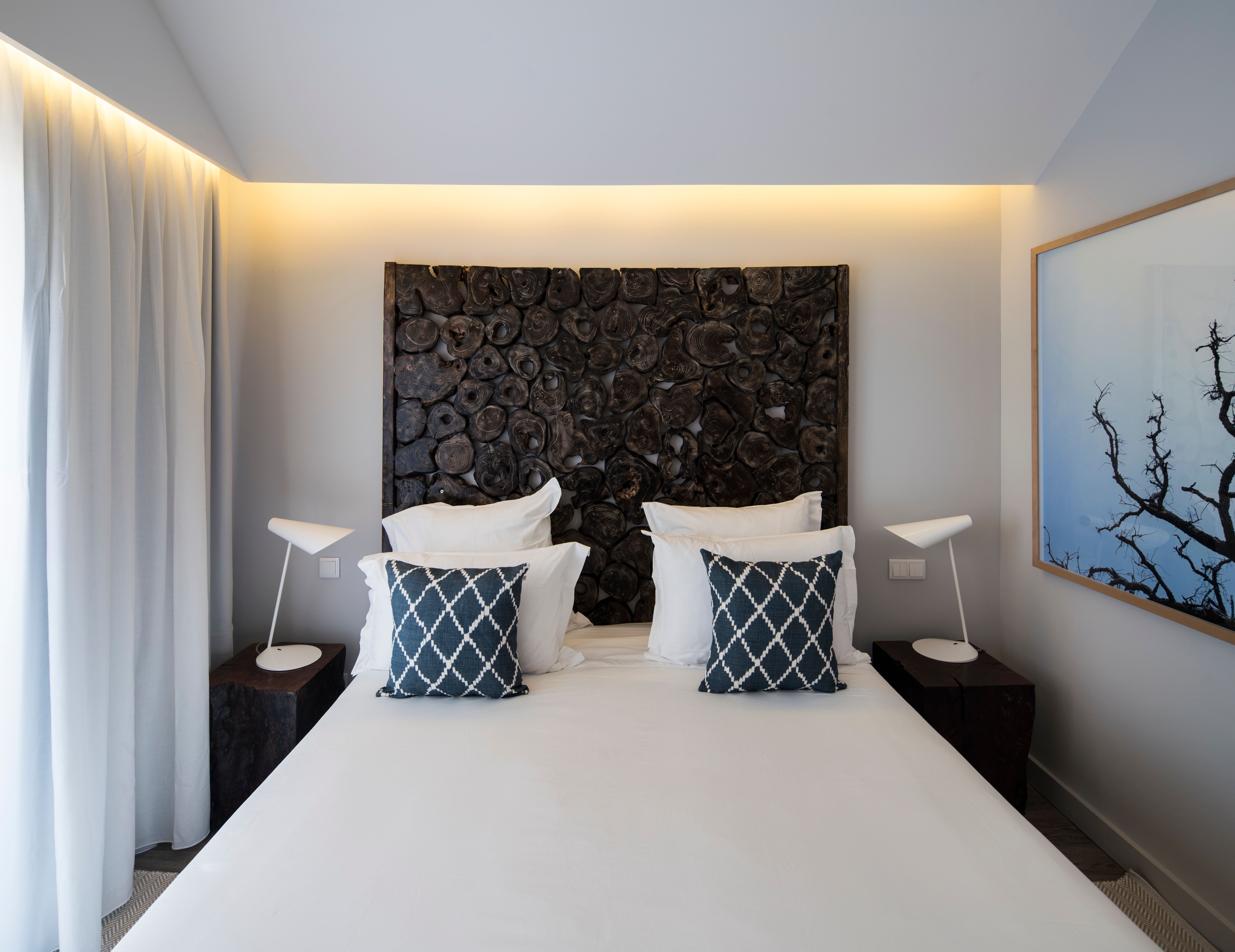 Simple elegance meets restful charm in your villa room at Sublime Comporta.