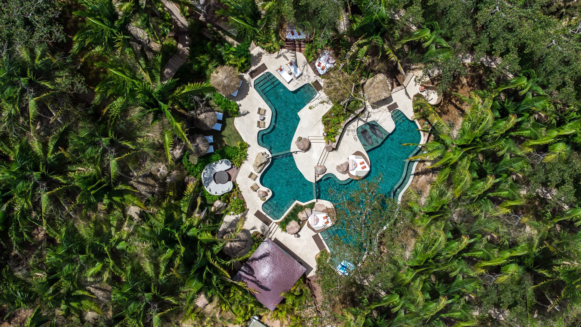 A beautifully designed interior featuring locally crafted furniture, artisan textiles, and a serene ambiance inspired by nature.