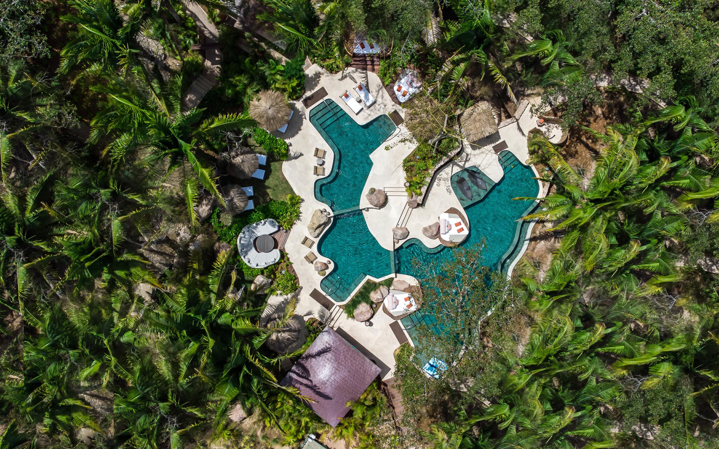 A beautifully designed interior featuring locally crafted furniture, artisan textiles, and a serene ambiance inspired by nature.