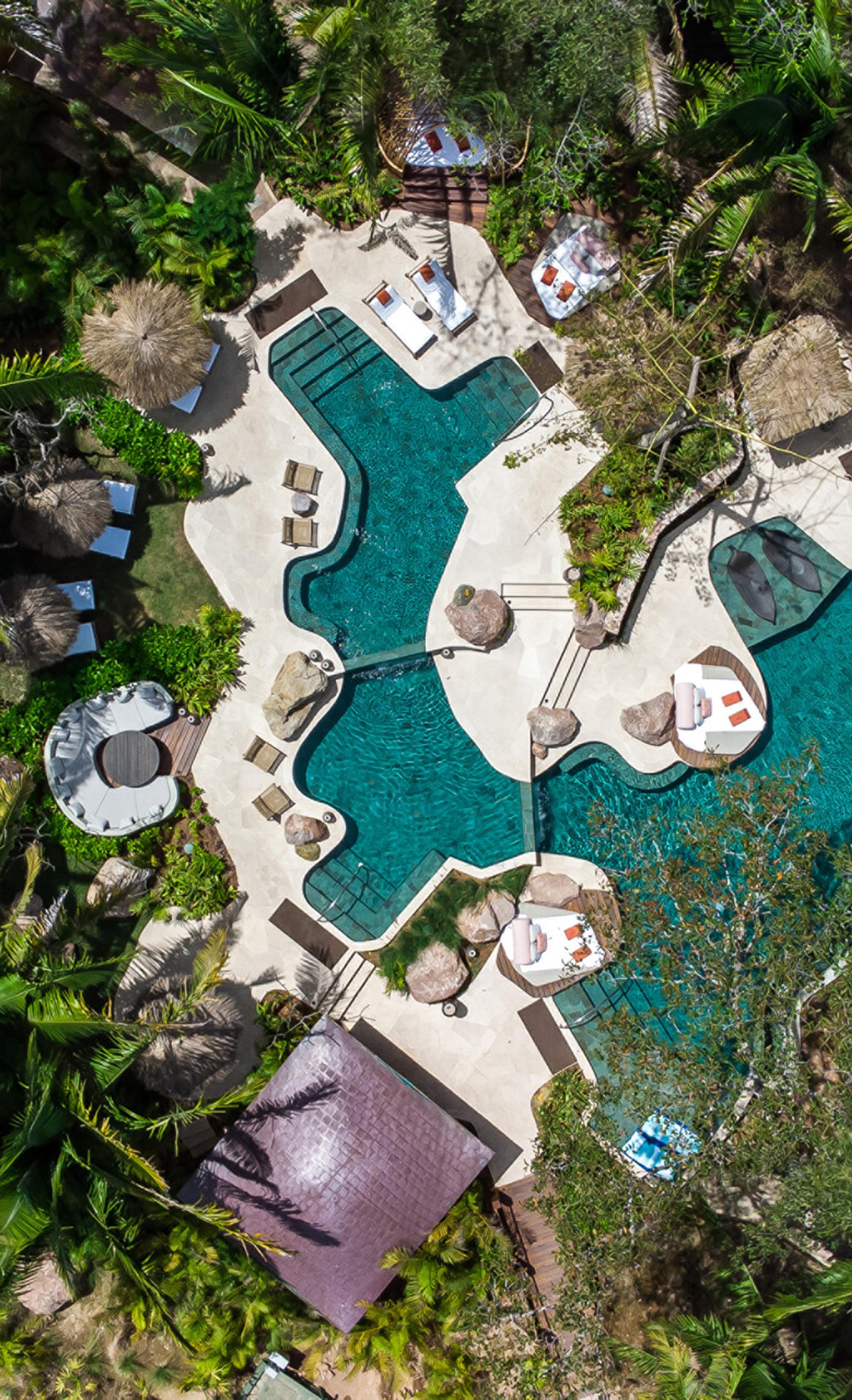 A beautifully designed interior featuring locally crafted furniture, artisan textiles, and a serene ambiance inspired by nature.