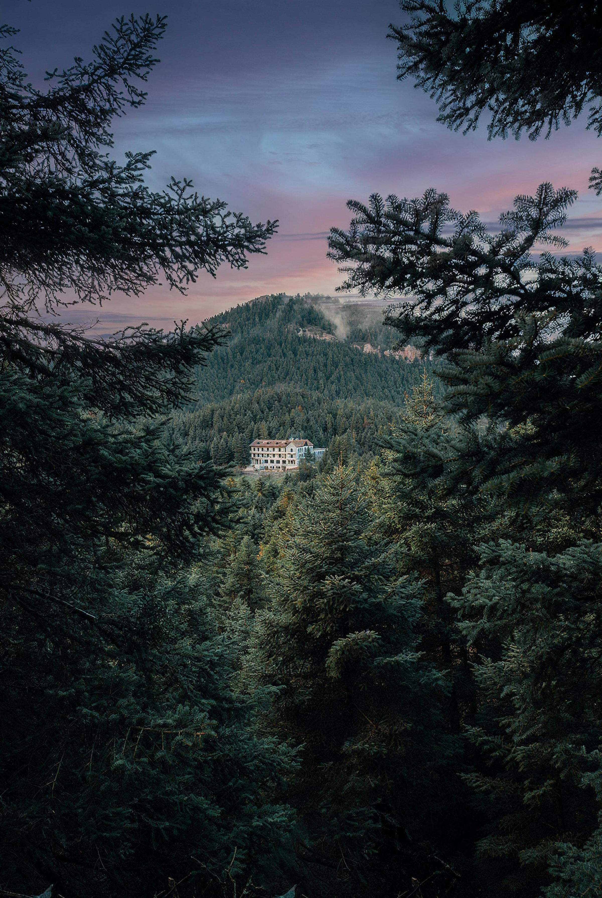 Peaceful natural surroundings at MANNA, highlighting lush greenery and mountain landscapes.