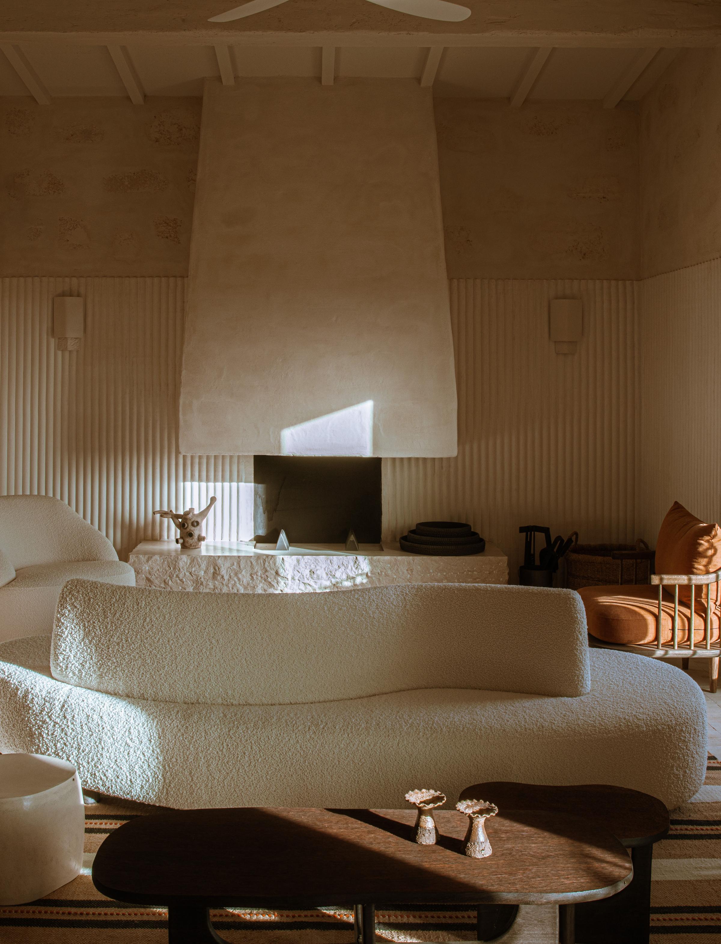 Wild Menorcan landscape with dry stone walls, olive trees, and soft golden light at Son Blanc
