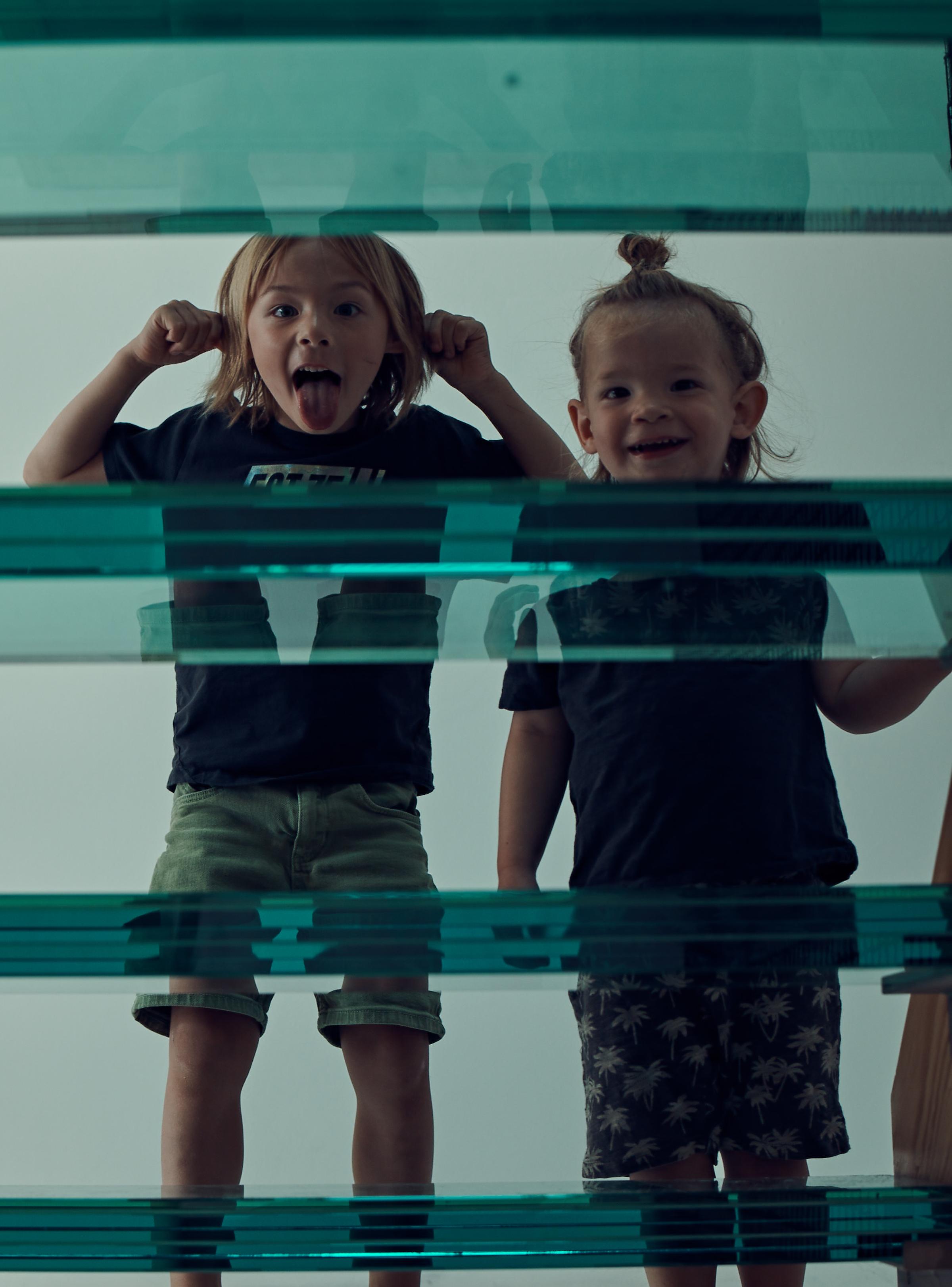 Kids playing at stairs