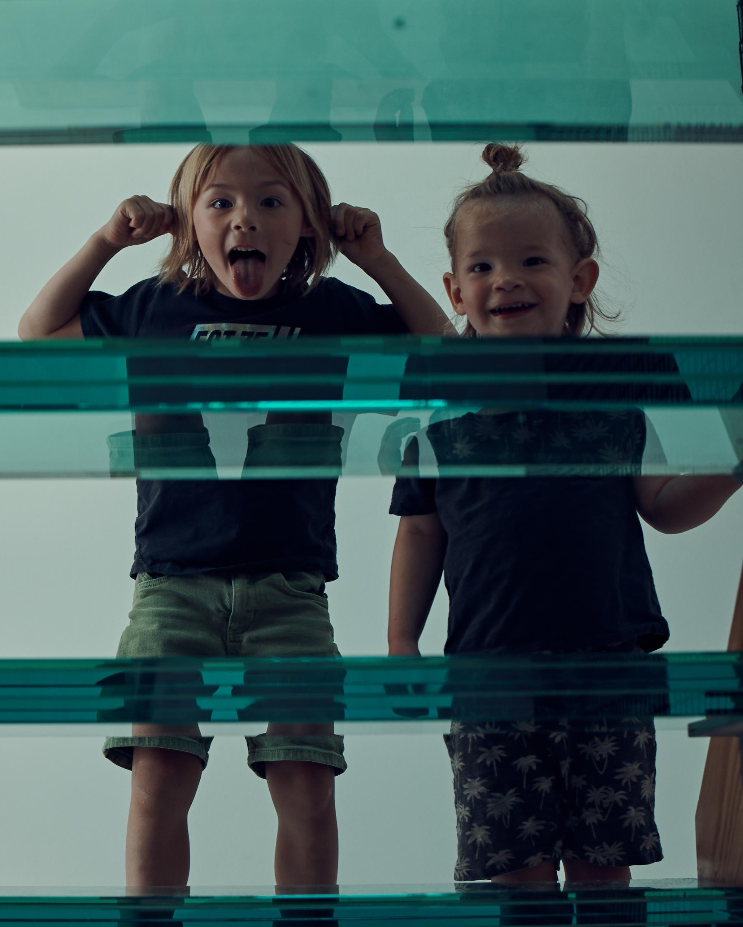 Kids playing at stairs