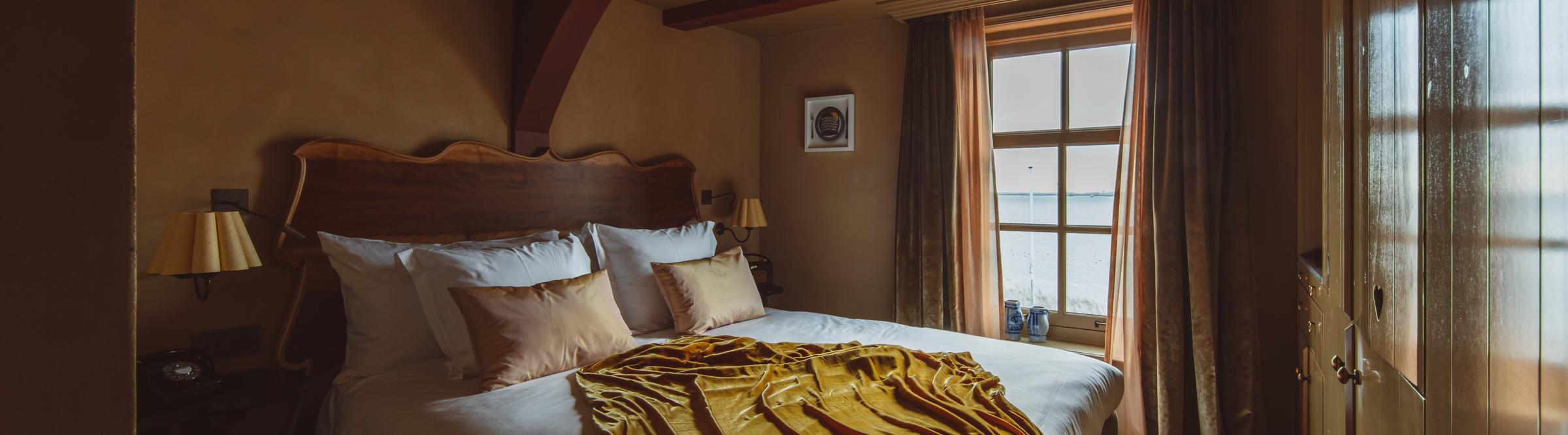 A cosy retreat wrapped in soft textures and quiet views.