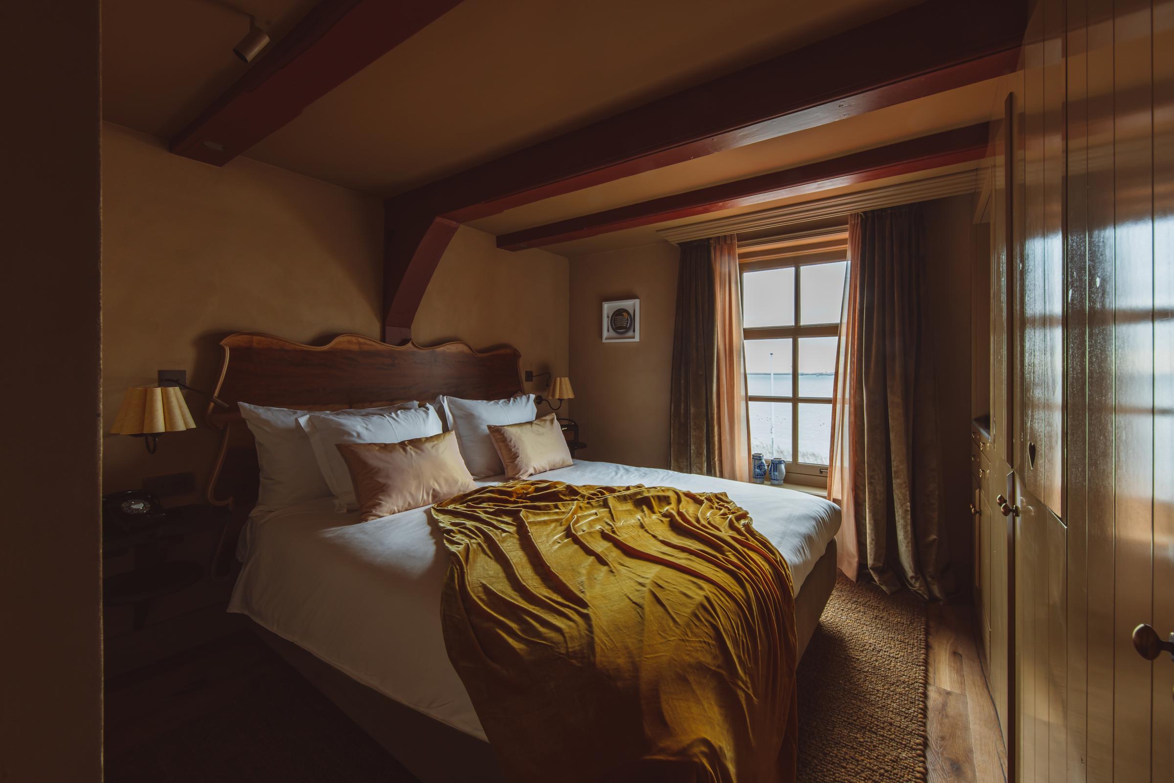 A cosy retreat wrapped in soft textures and quiet views.