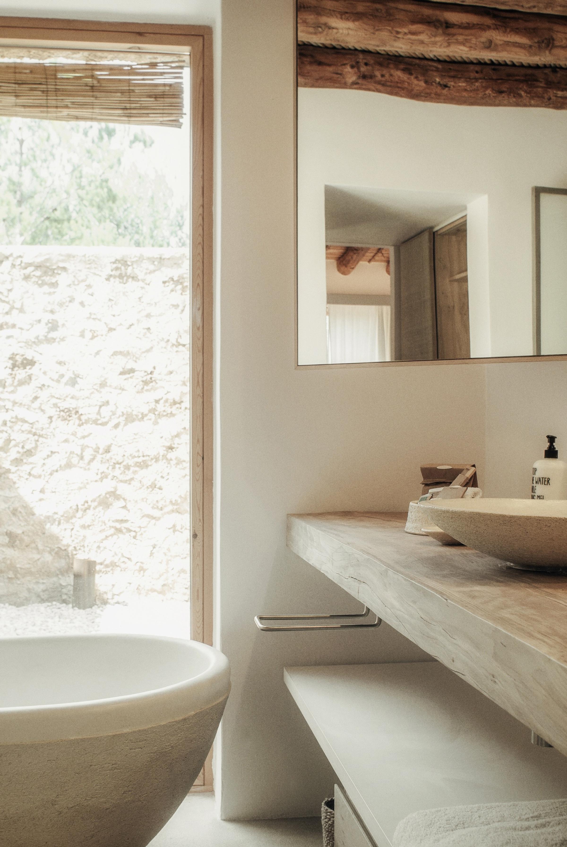 Cozy casita room at Es Racó d'Artà, featuring serene interiors and outdoor access.