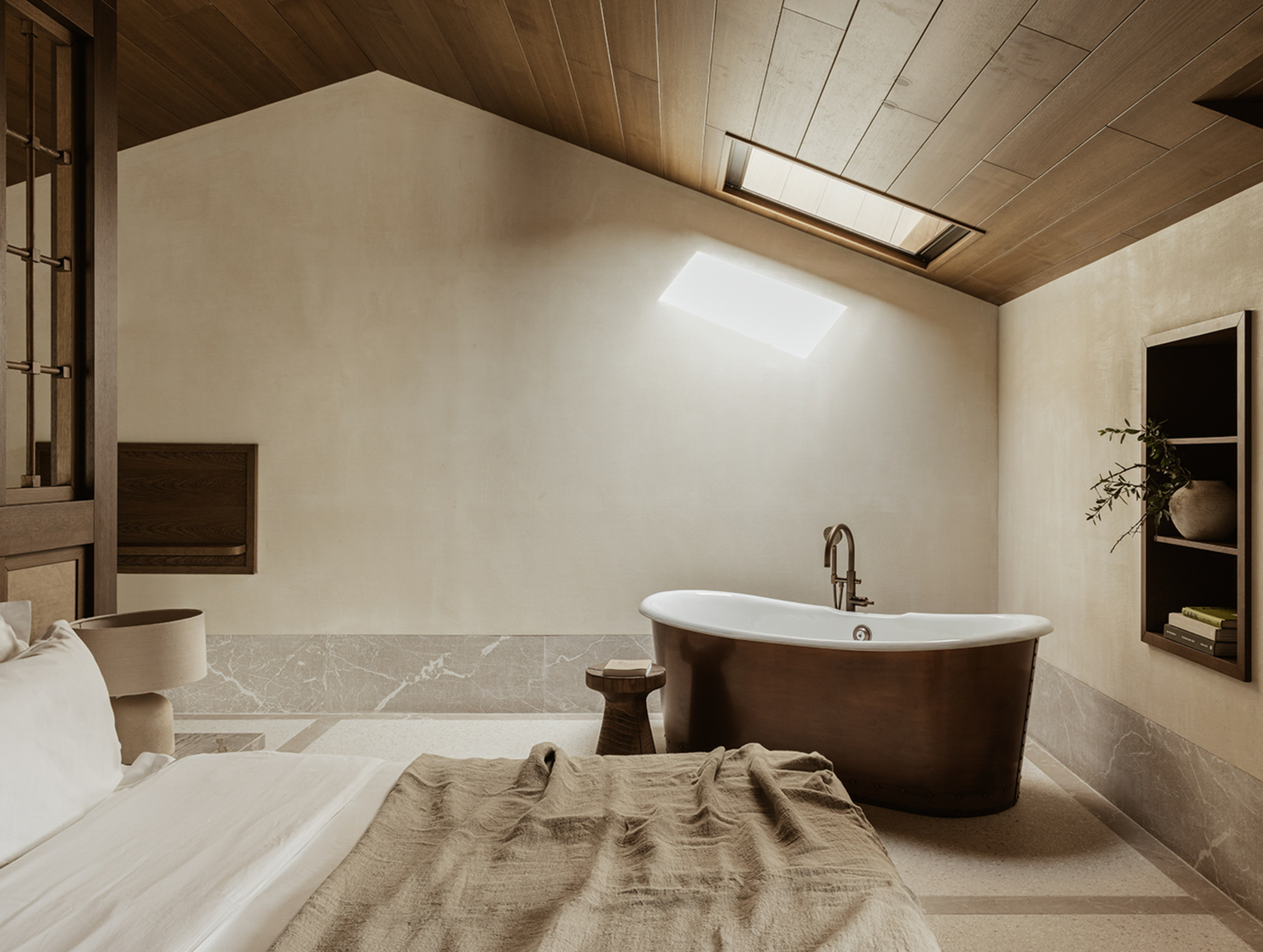 Luxurious MANNA Suite blending contemporary design with natural elements, creating a serene atmosphere.