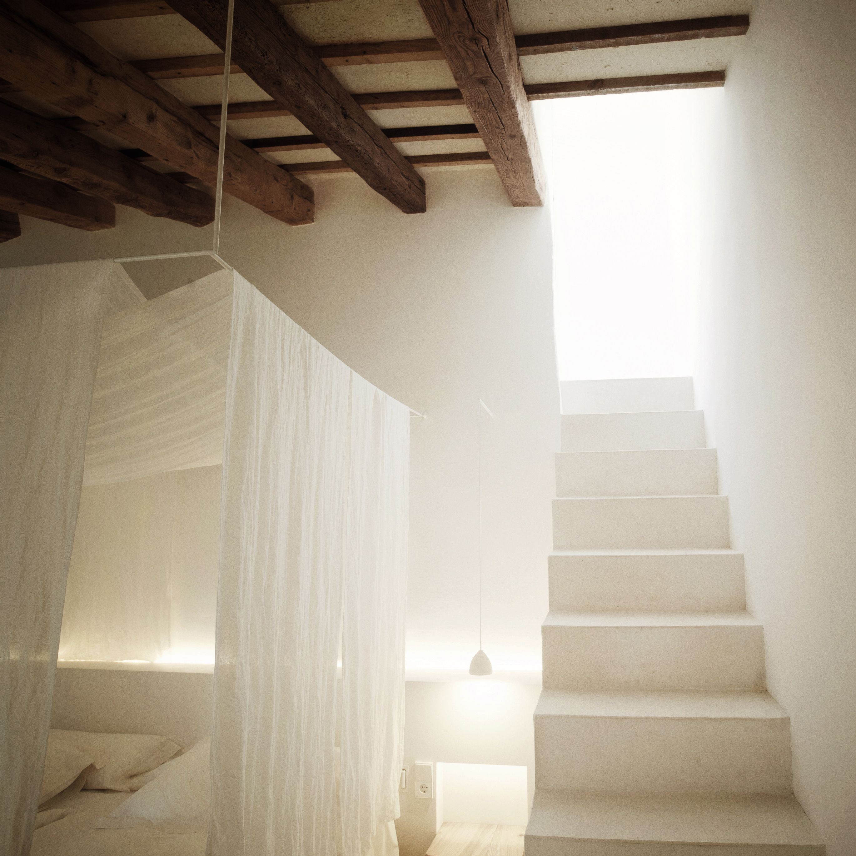 Relax and unwind in the Possessió Suite, your serene haven blending historic elegance with modern amenities.