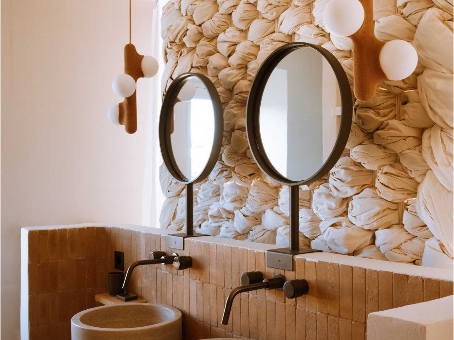 Inviting guest suite at Son Blanc, showcasing refined aesthetics, warm neutral tones, and a harmonious atmosphere.