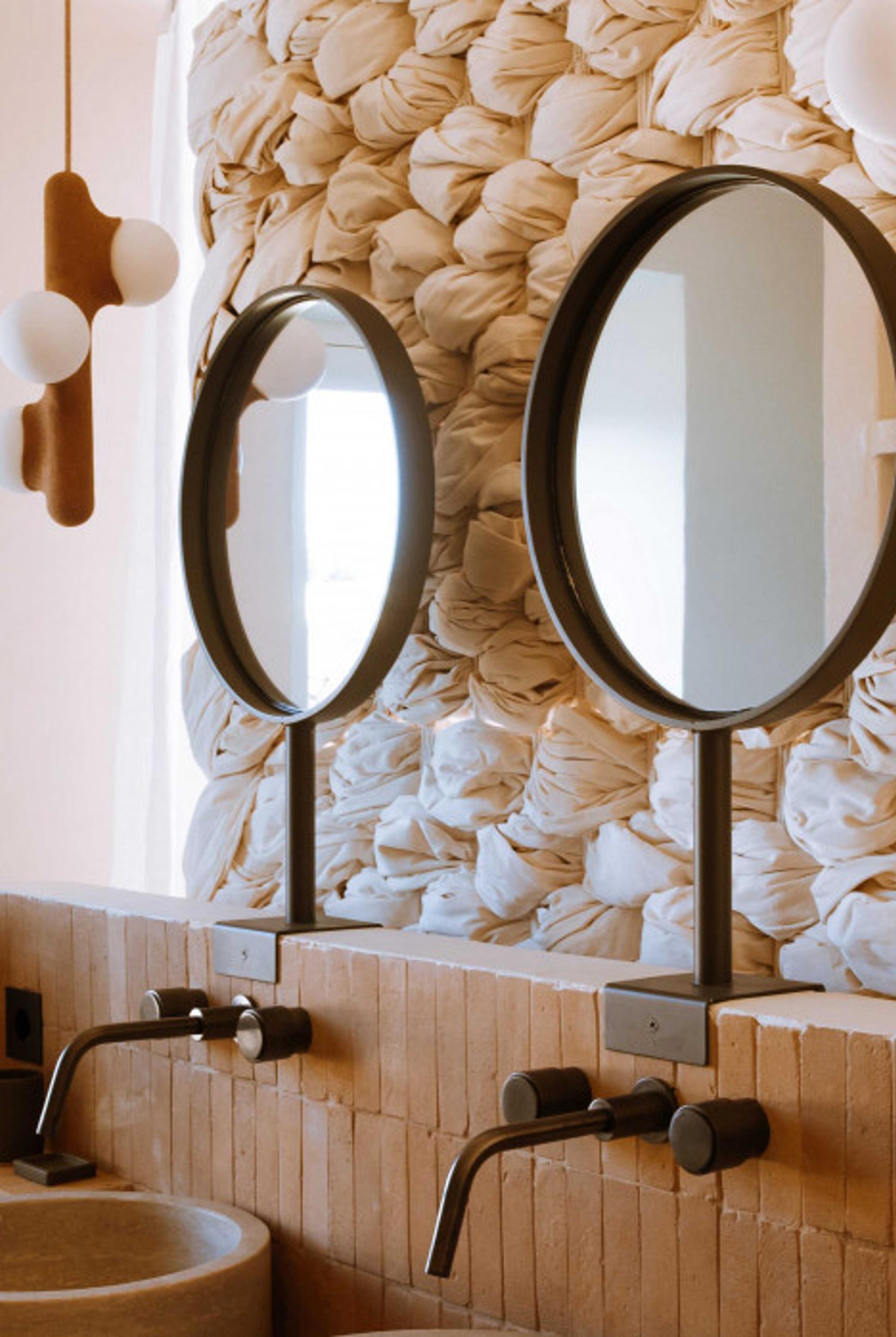 Inviting guest suite at Son Blanc, showcasing refined aesthetics, warm neutral tones, and a harmonious atmosphere.