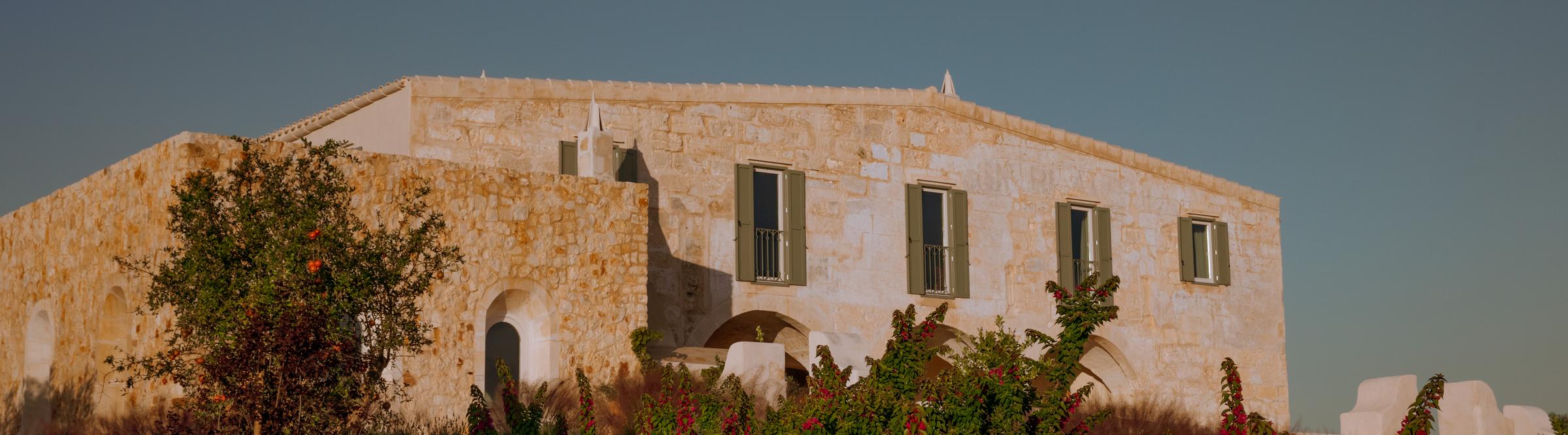 Unwind by the tranquil poolside at Son Blanc Farmhouse, a serene oasis in the heart of Menorca.